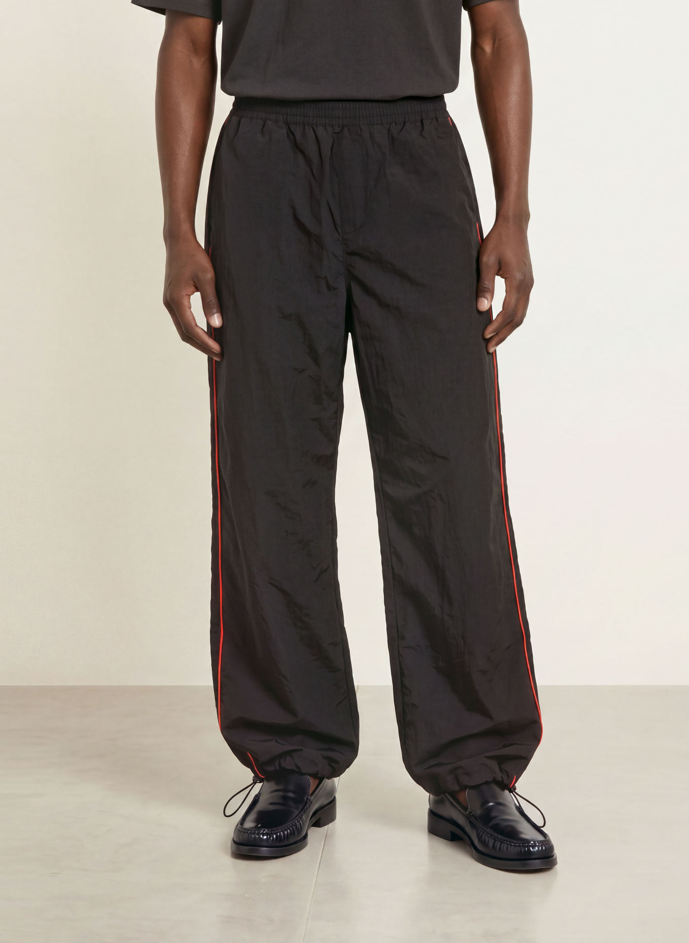 WRSTBHVR JALE Training Pants with Braided Stripes: BLACK / RED