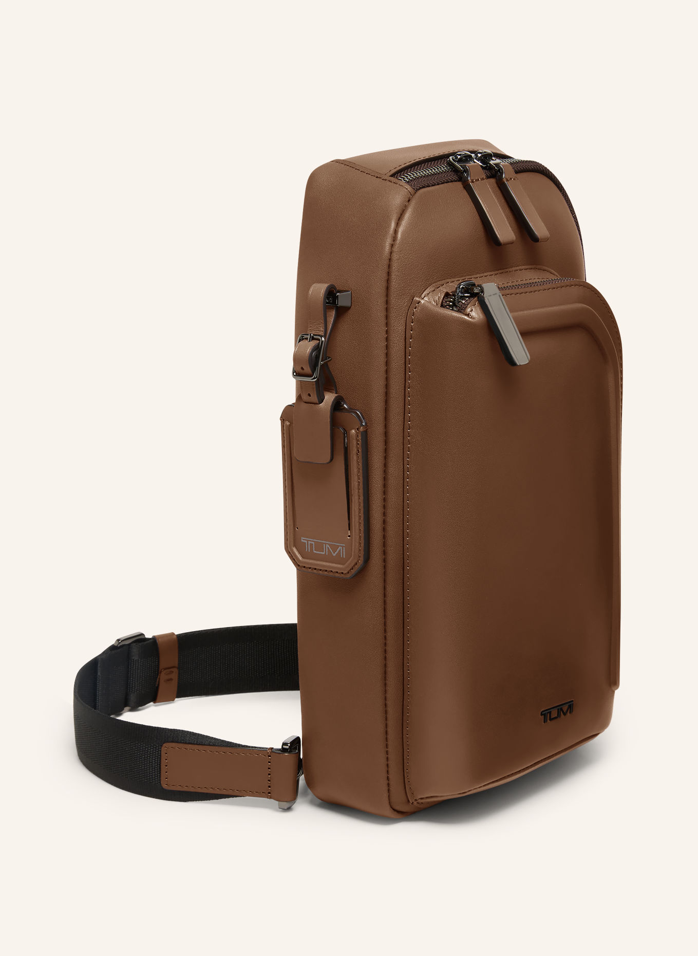 TUMI HARRISON schoudertas GREGORY SLING: COGNAC