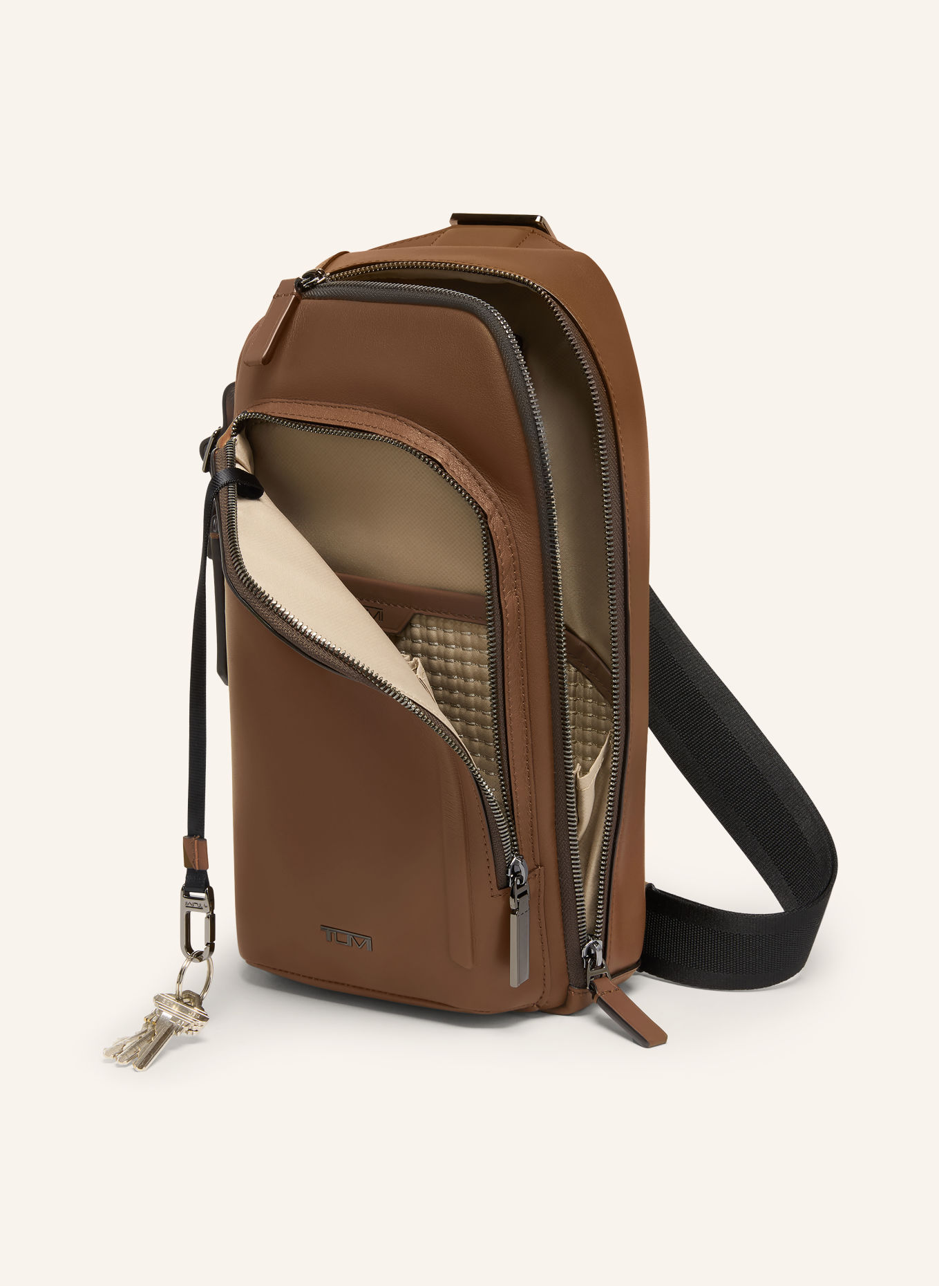 TUMI HARRISON schoudertas GREGORY SLING: COGNAC