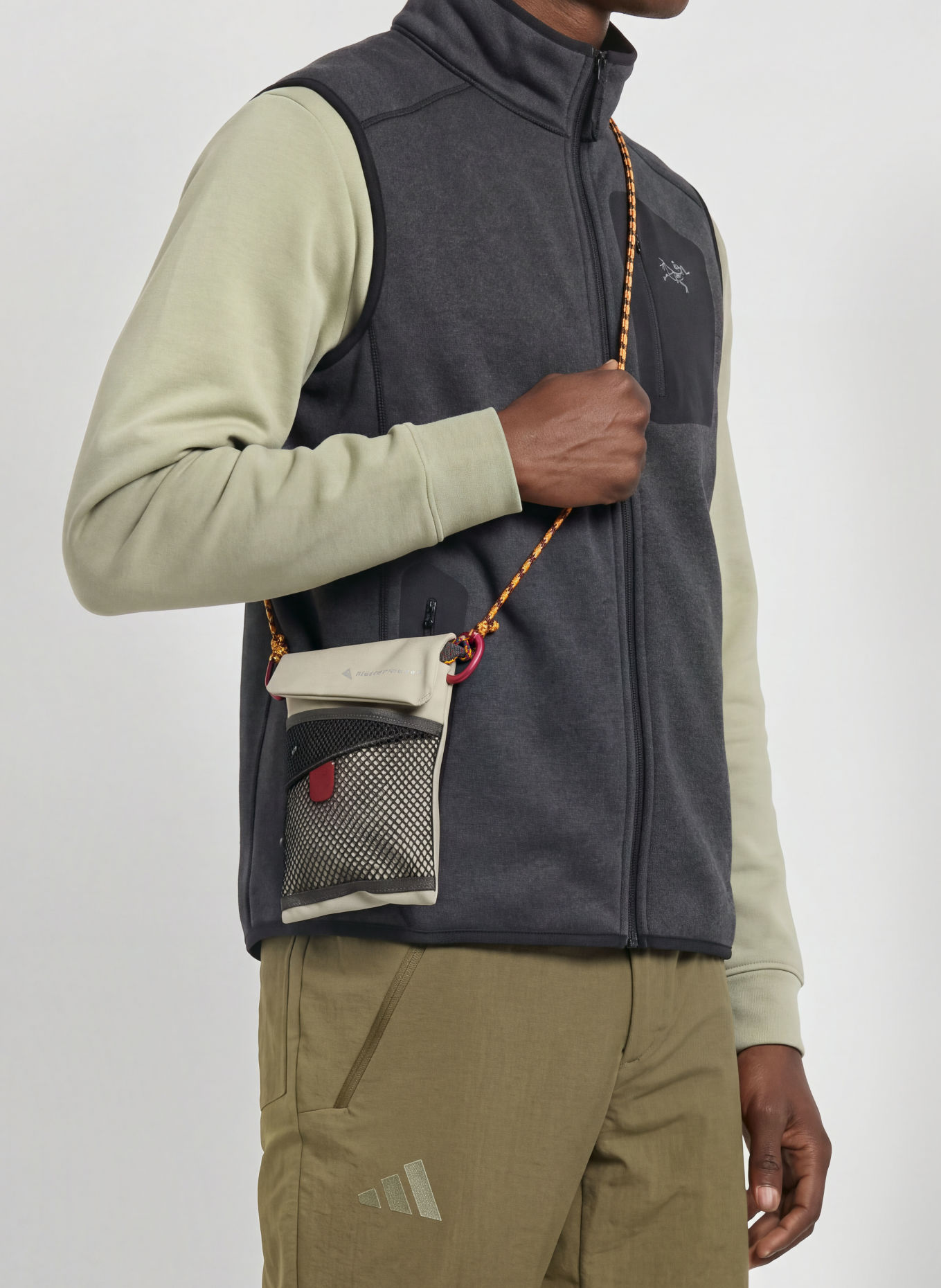 Klättermusen Crossbody bag HRID WP: CREAM / DARK GRAY / DARK RED