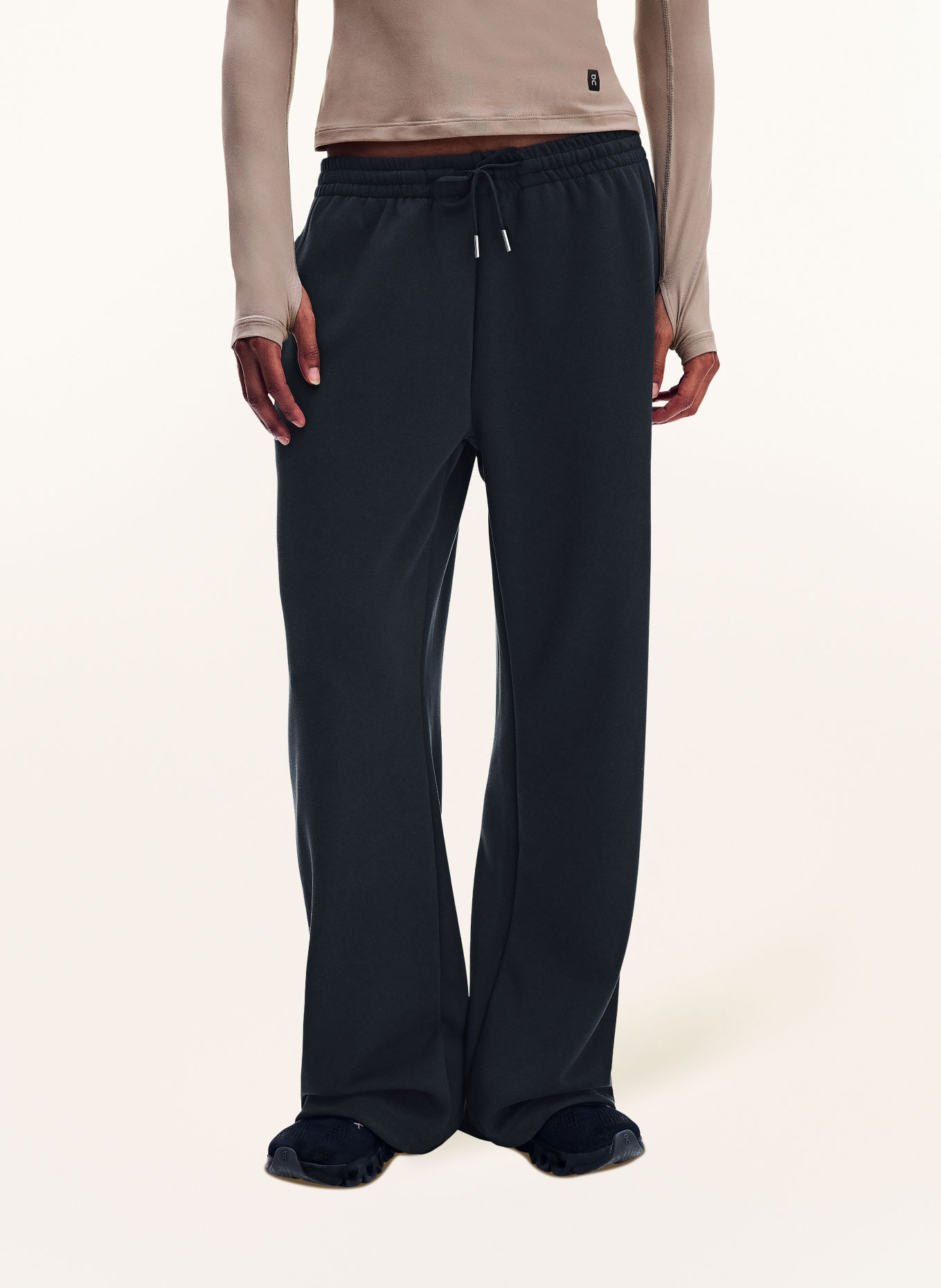 On STUDIO Training pants: BLACK