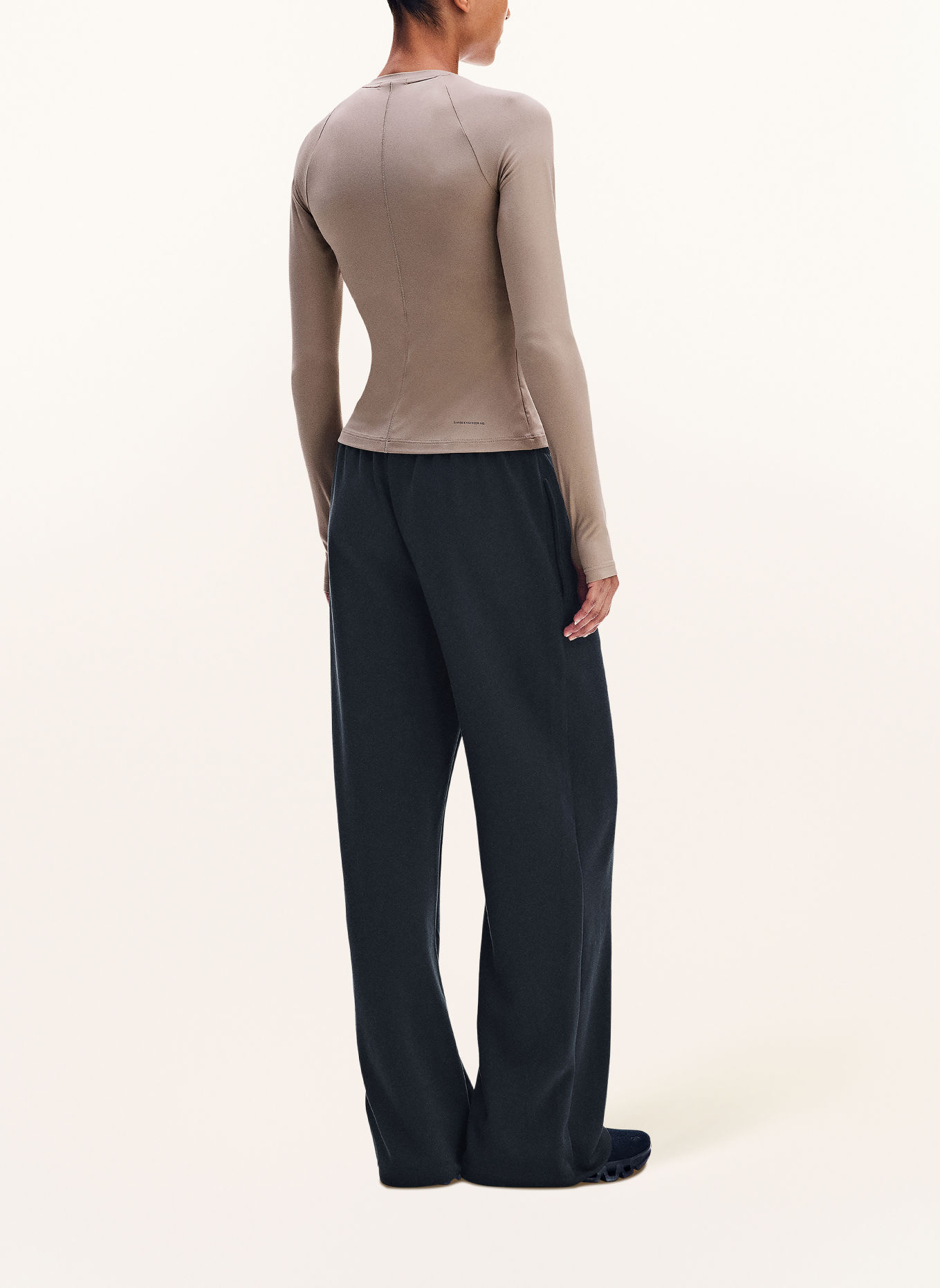On STUDIO Training pants: BLACK