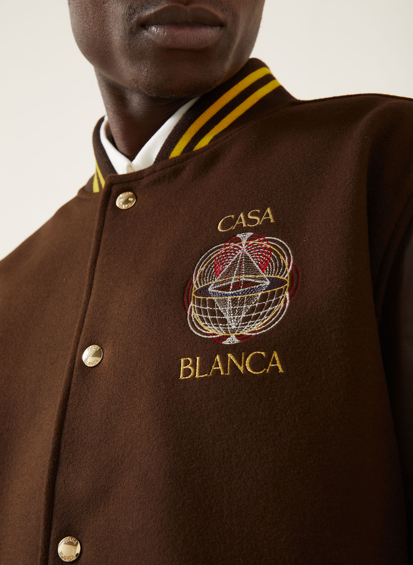 Casablanca College-Jacke: DUNKELBRAUN / DUNKELGELB