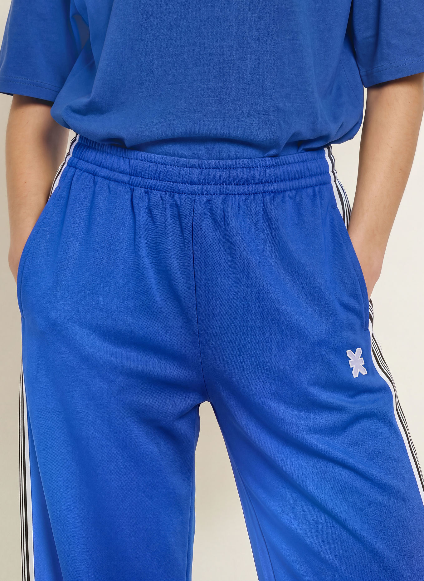 KARO KAUER Track pants: BLUE / WHITE / BLACK
