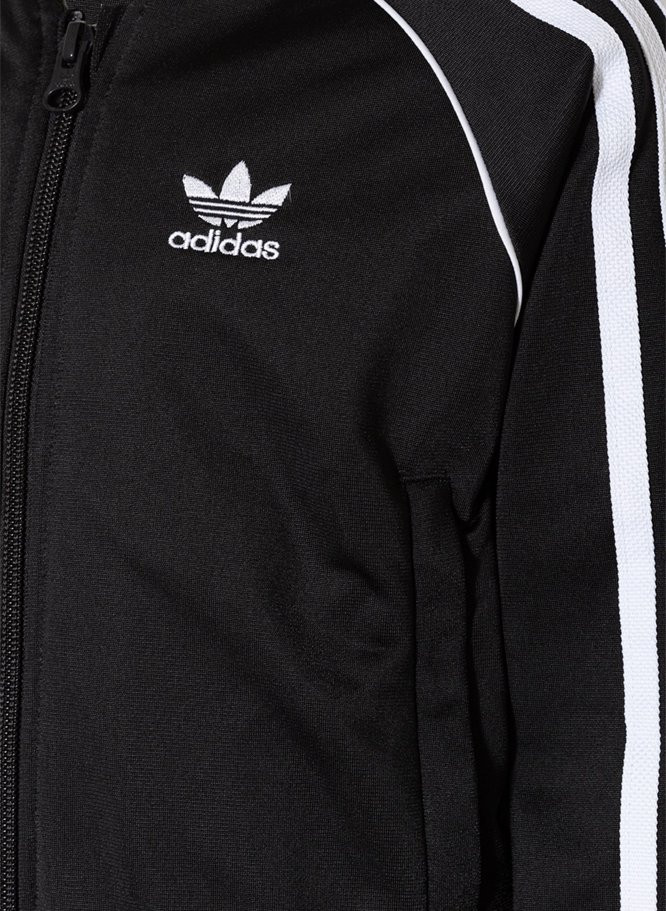 adidas Originals in schwarz/ Galonstreifen Trainingsanzug weiss mit