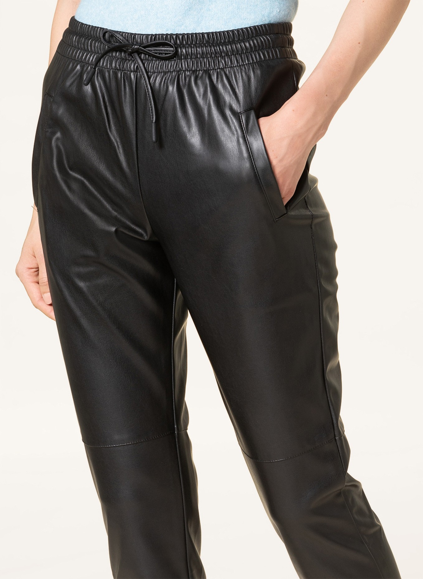 HERZEN S ANGELEGENHEIT Pants in jogger style in leather look in black