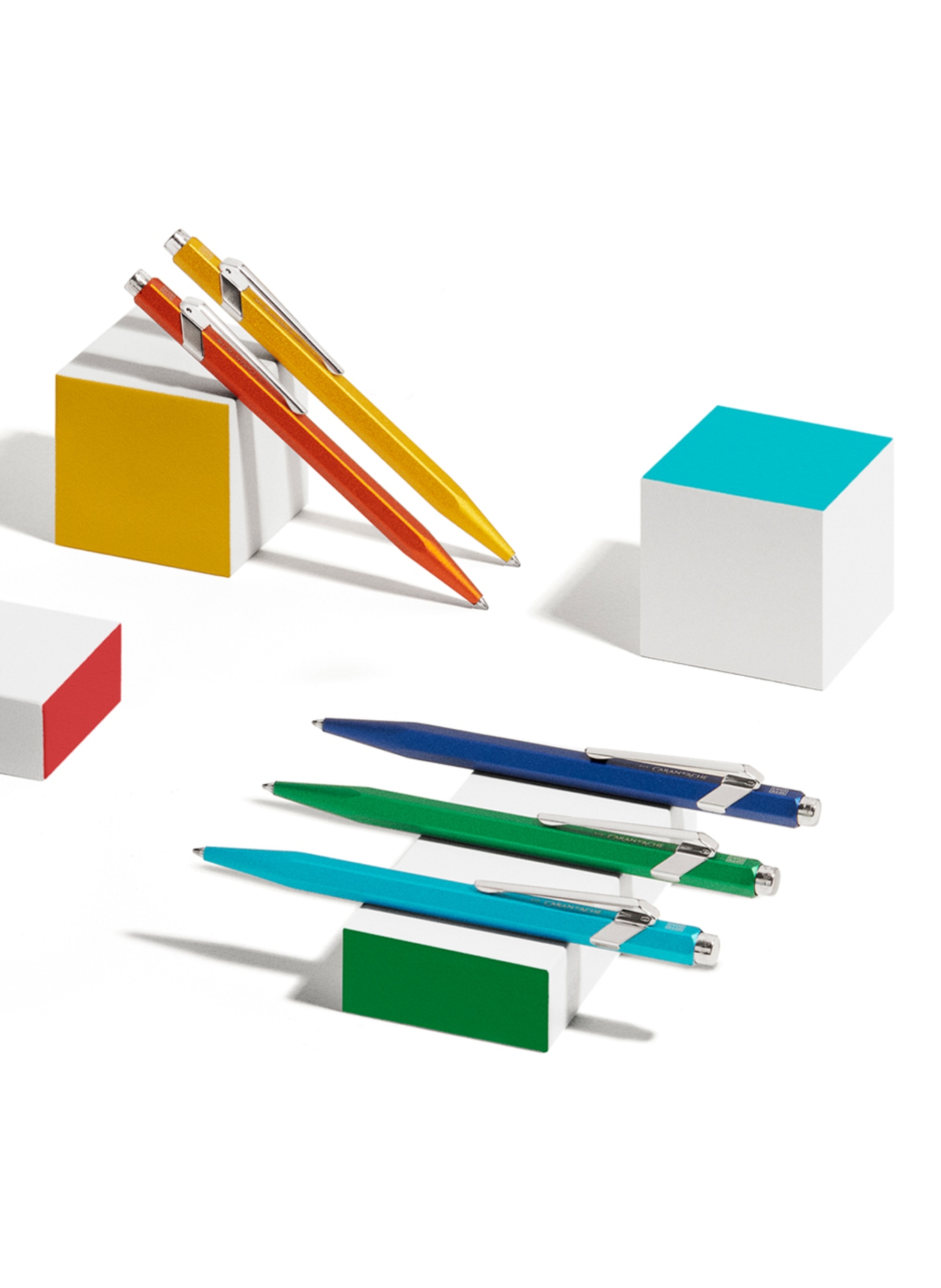 CARAN d'ACHE Stiskací kuličkové pero 849 COLORMAT-X: ORANŽOVÁ