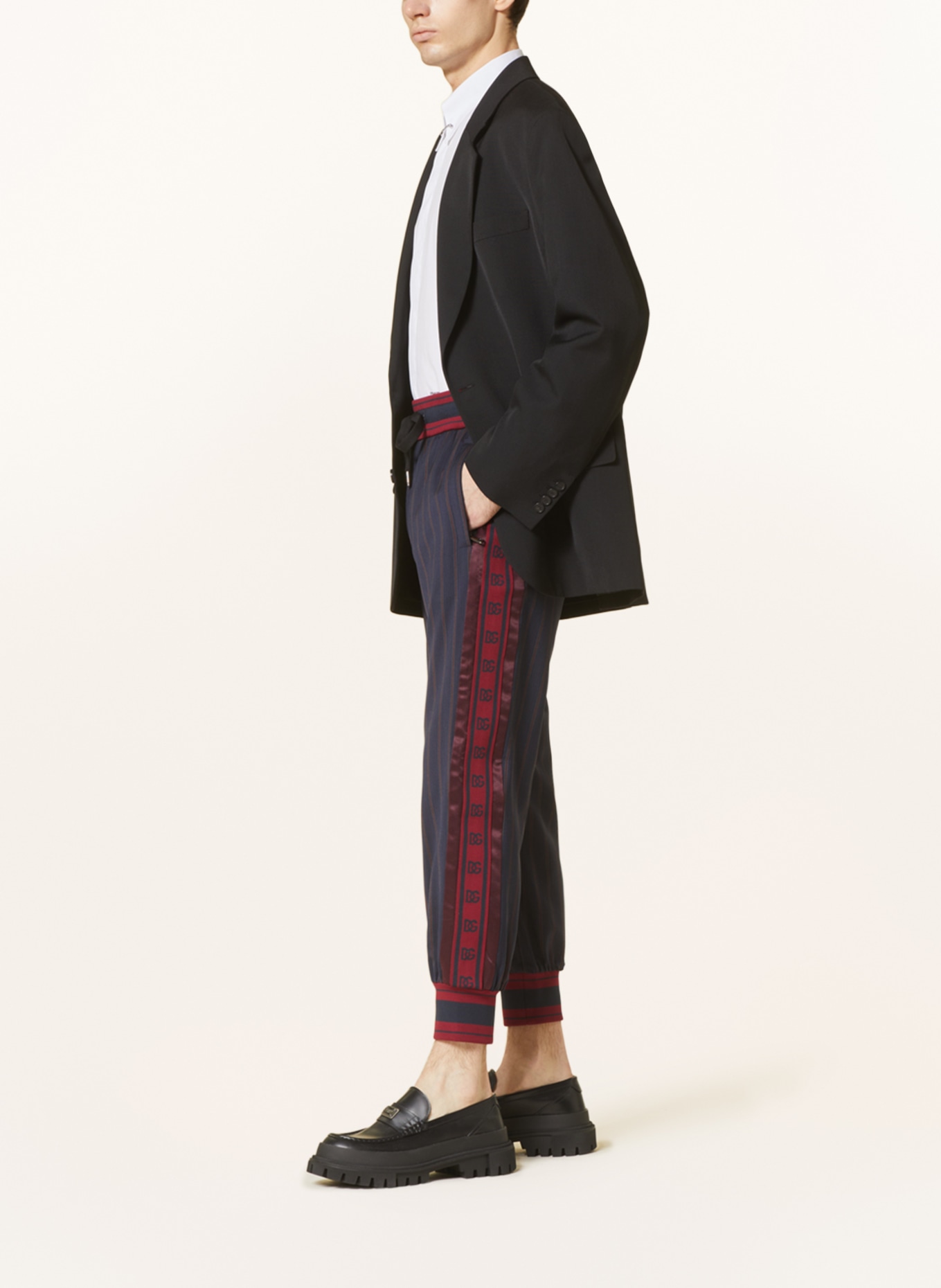 DOLCE & GABBANA Pants in jogger style with tuxedo stripes in black/ dark red