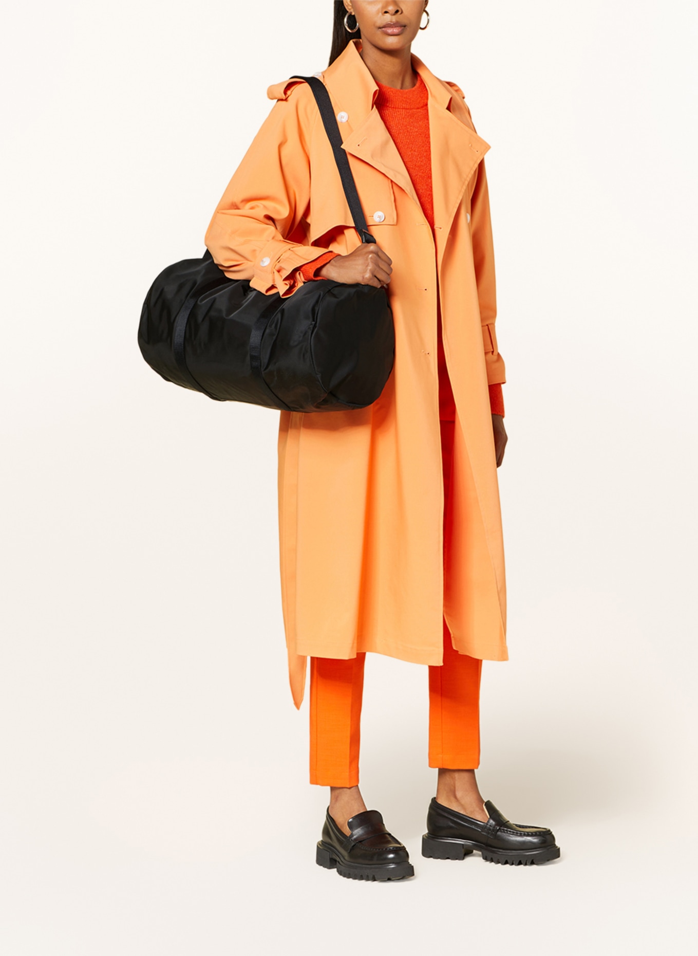 Tumi raincoat outlet