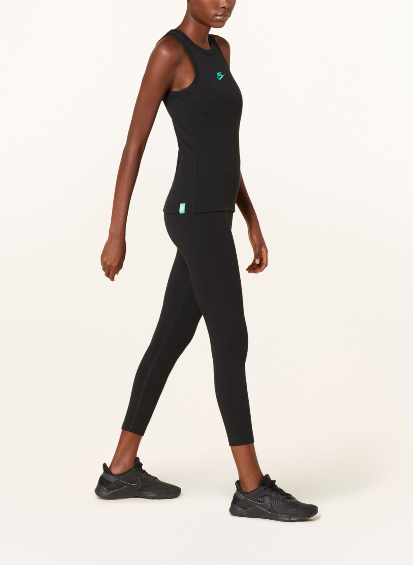Nike Zenvy Women's Dri-FIT Full-Length Flared Bodysuit.