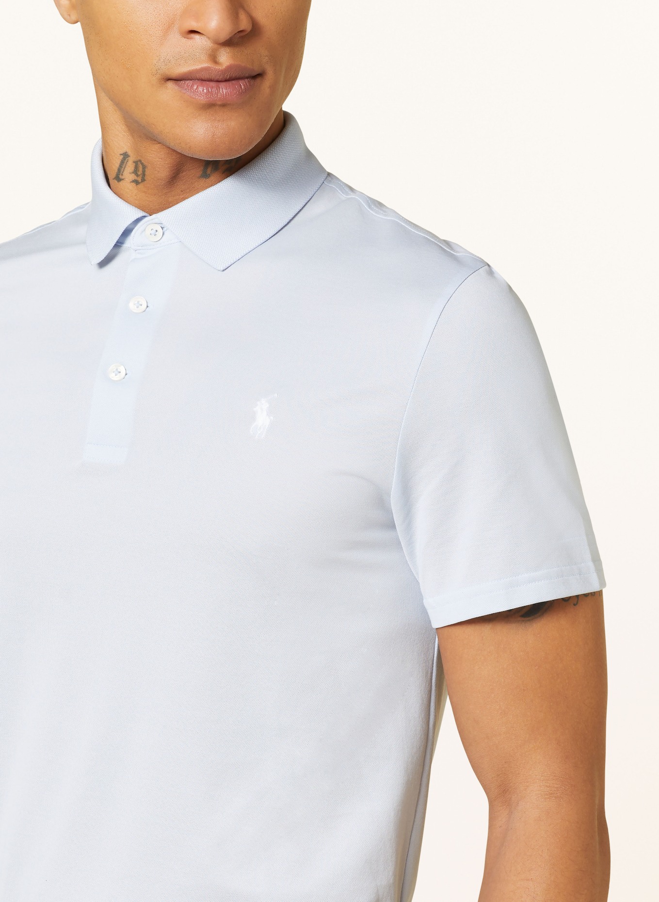 RLX RALPH LAUREN Performance polo shirt in light blue