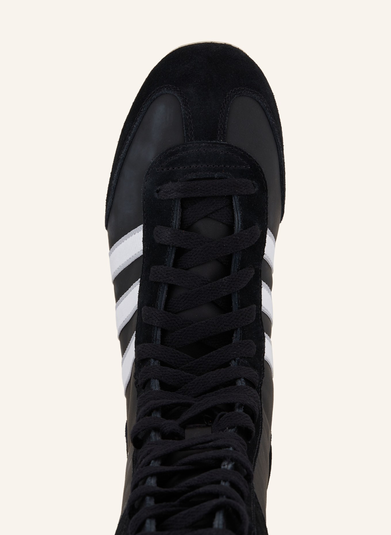 Black high top adidas 2025