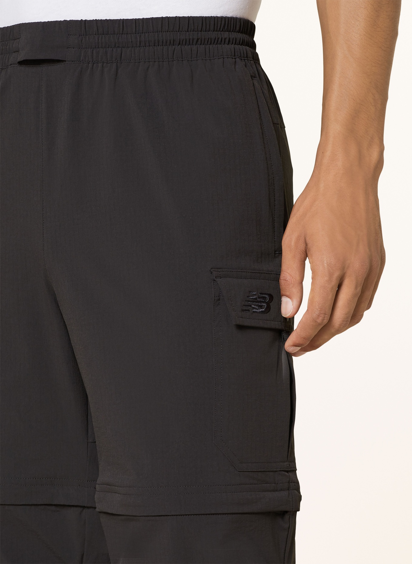new balance Zip off trousers in black