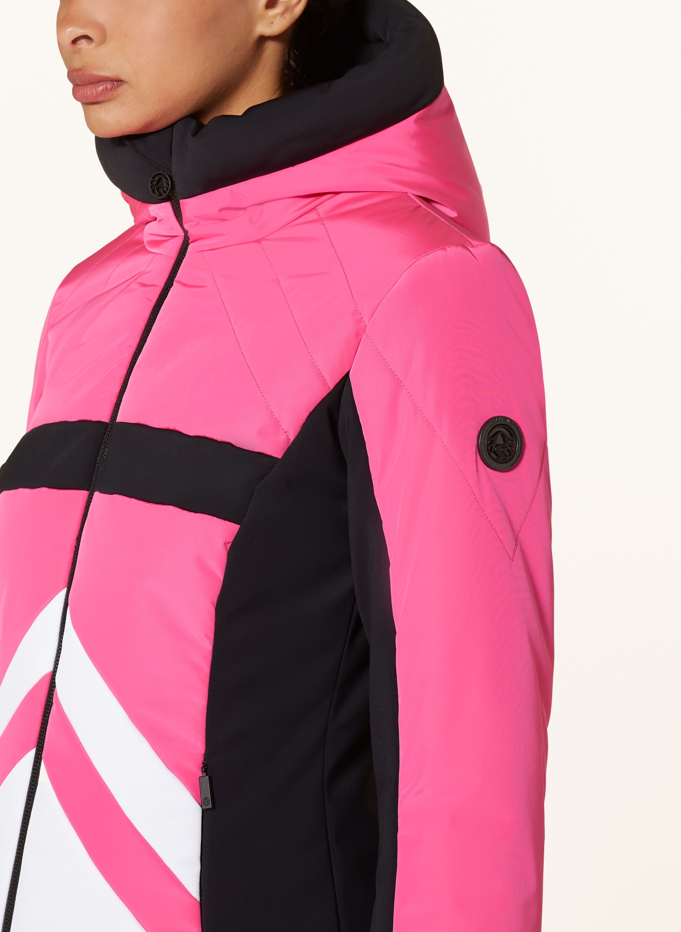 Pink and white ski jacket on sale