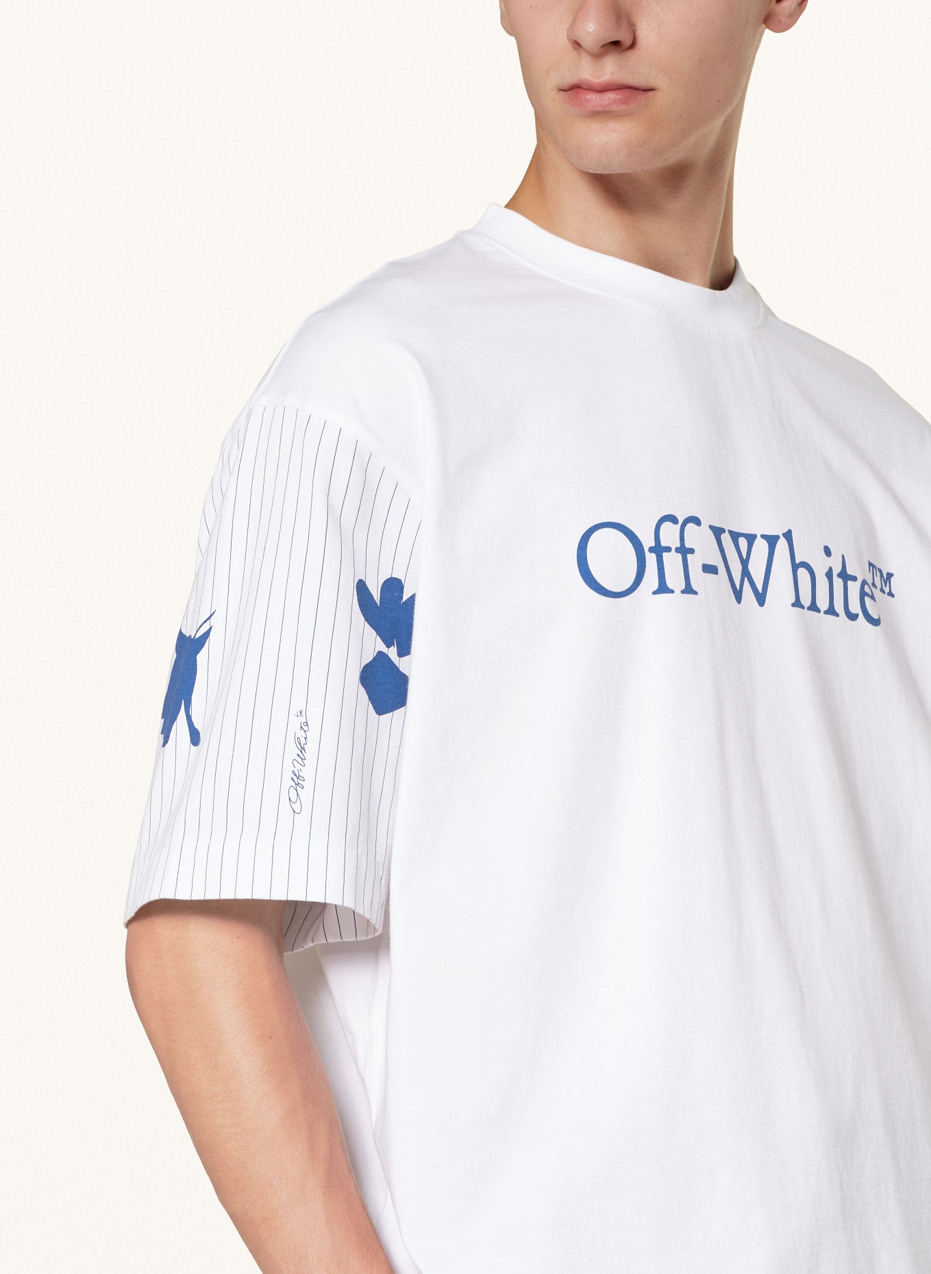 White and blue t shirt top
