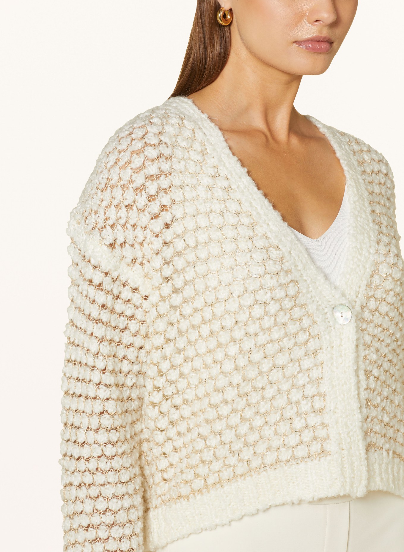 White and gold cardigan top