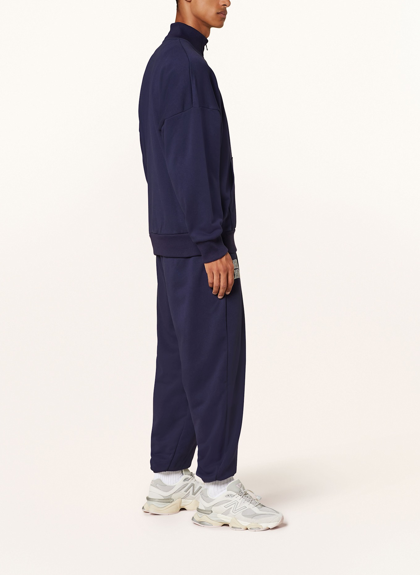 UNDER ARMOUR Tepláky UA ICON: TMAVĚ MODRÁ