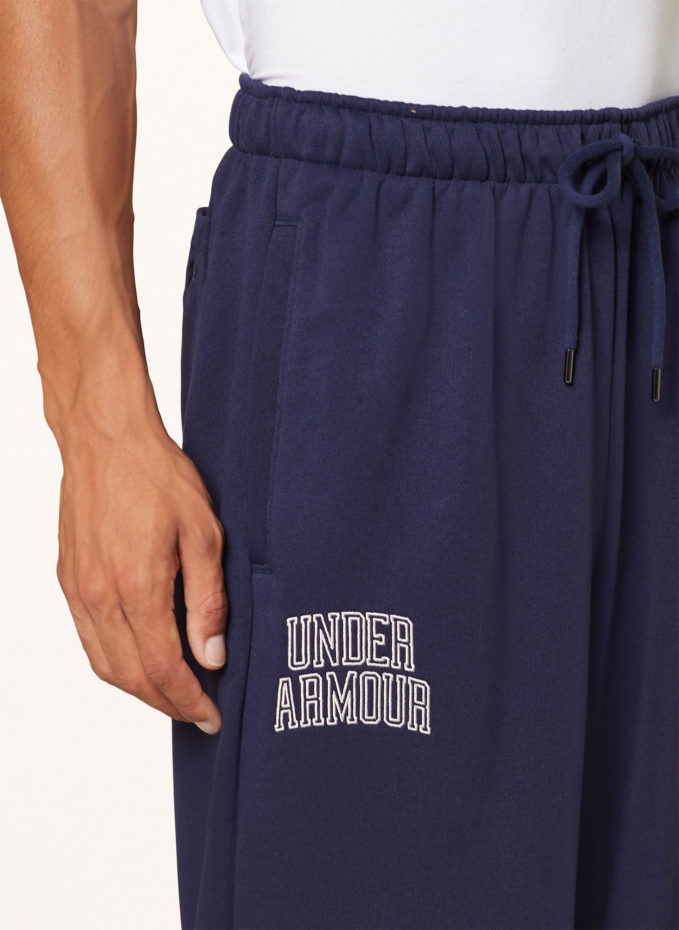 UNDER ARMOUR Tepláky UA ICON: TMAVĚ MODRÁ