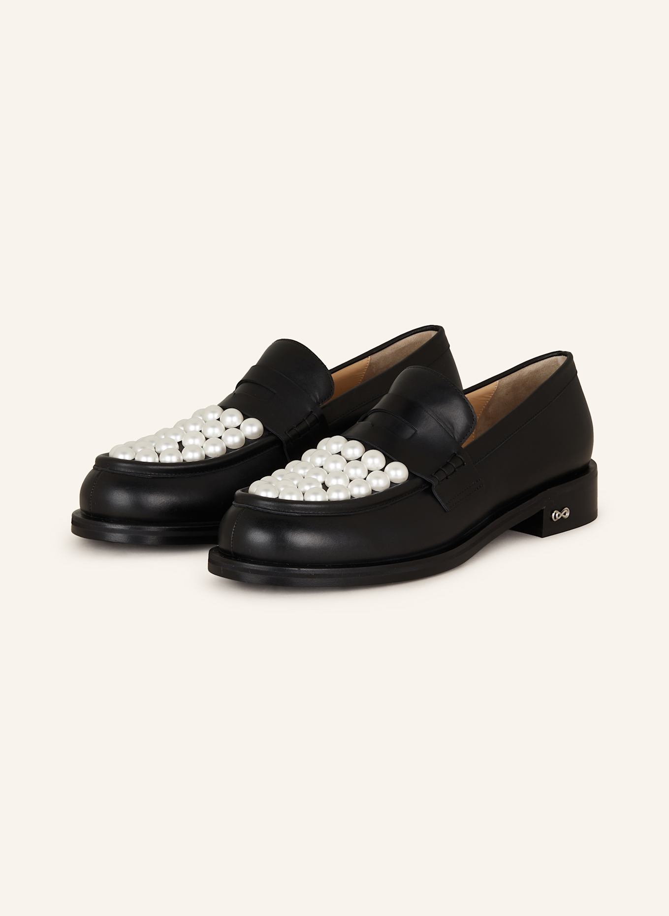 Penny loafers and pearls top