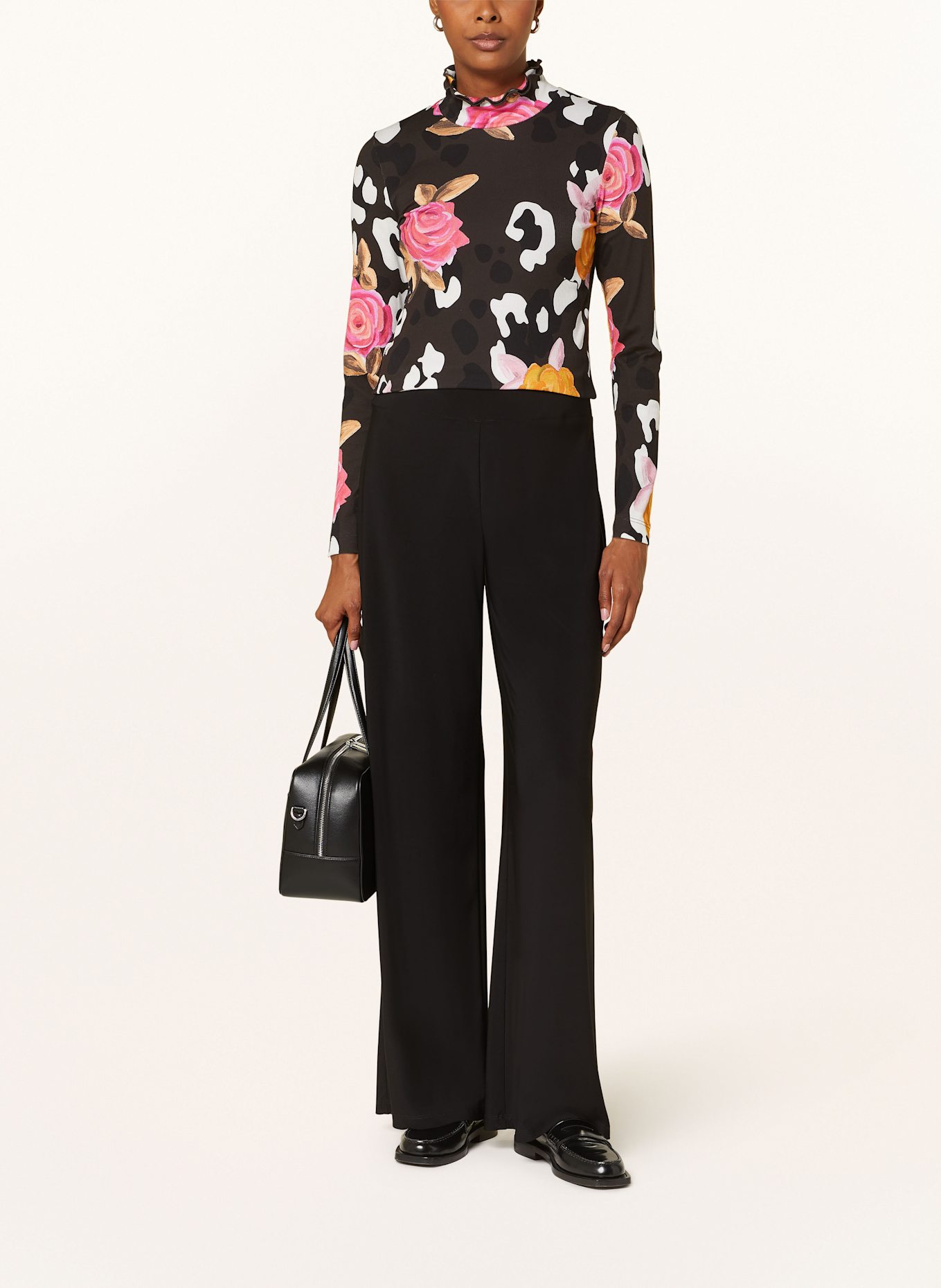 Black long sleeve shirt with ruffles on sale