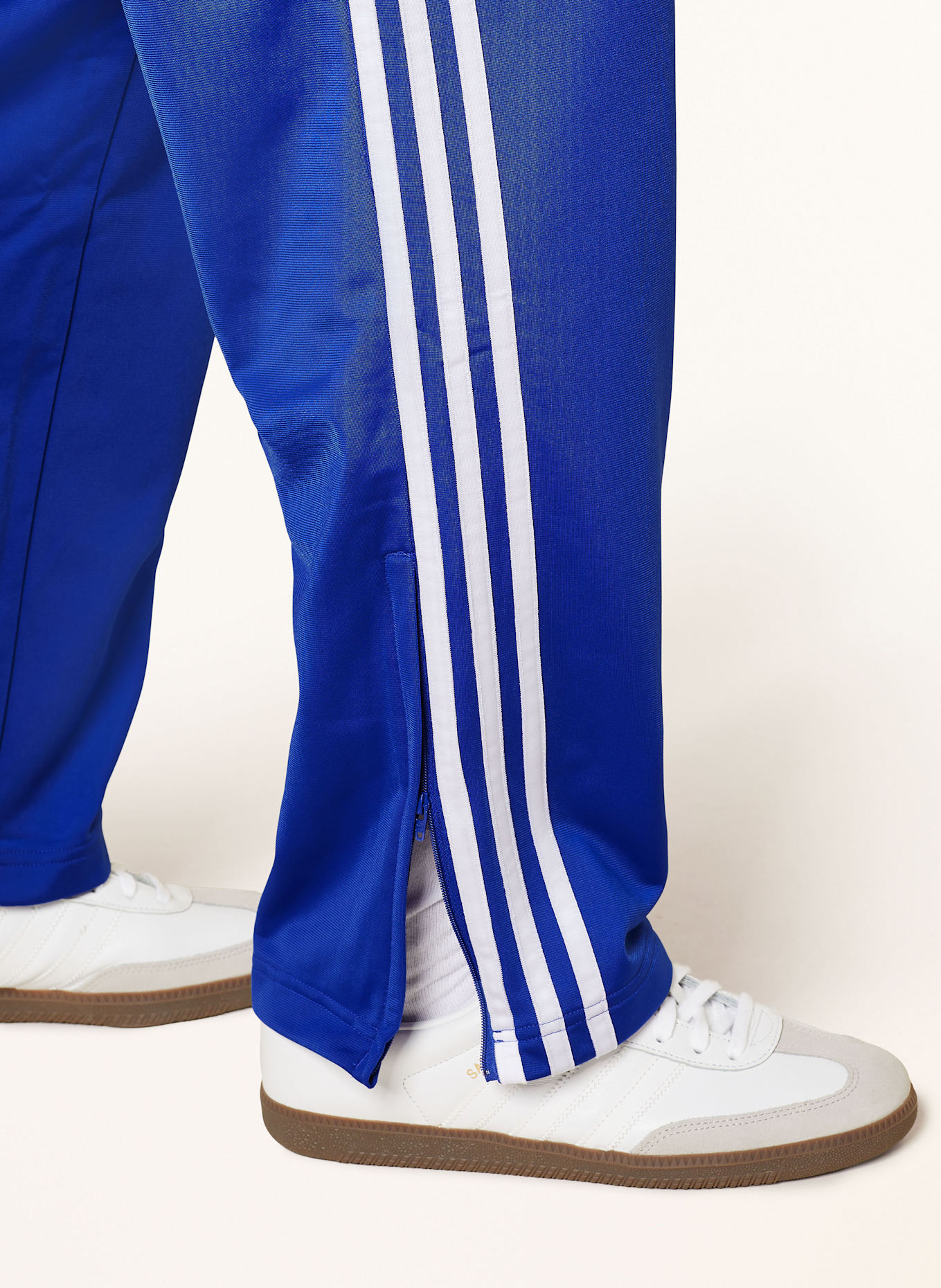 White and blue adidas pants online