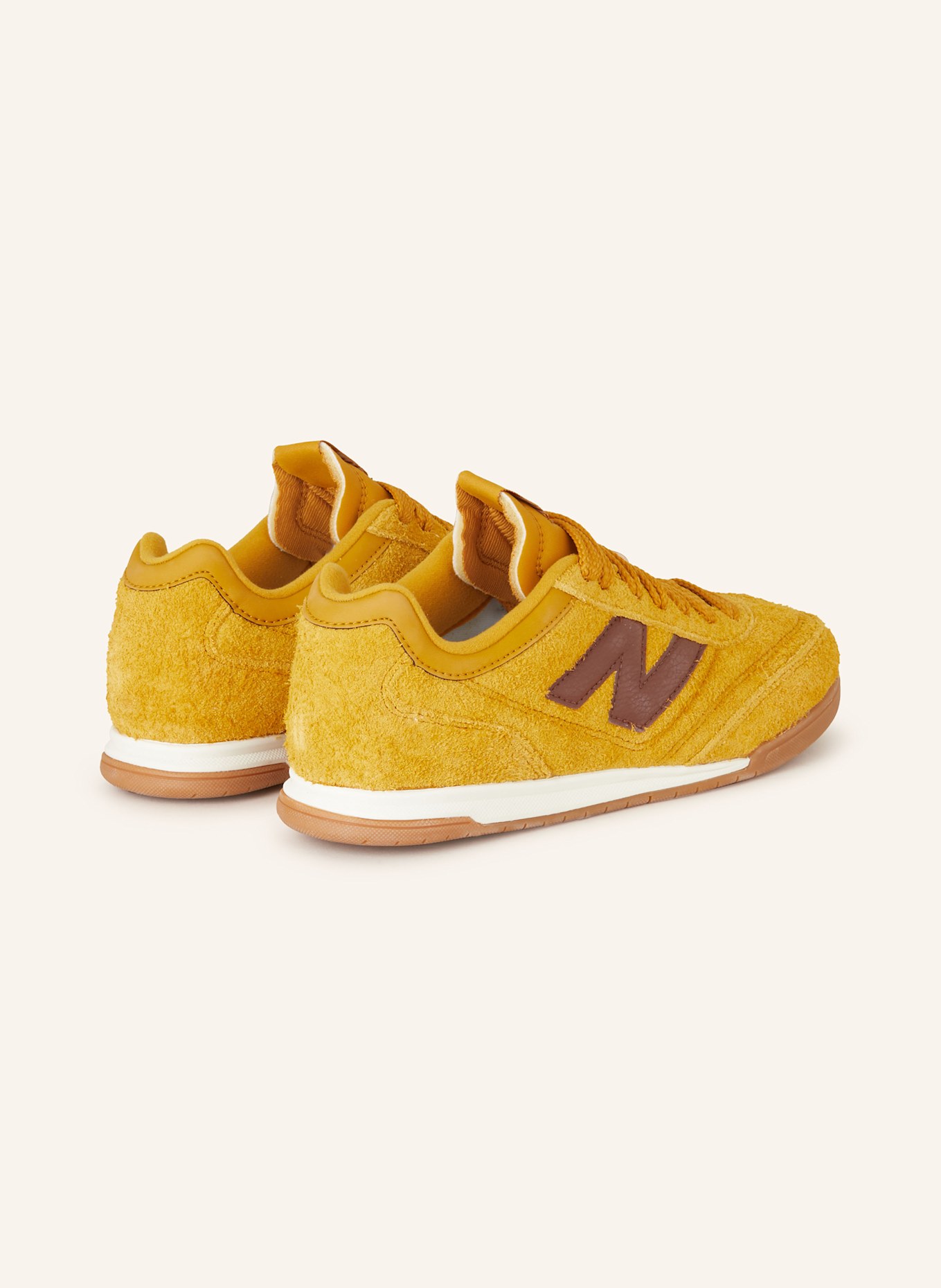 Yellow new balance sneakers top