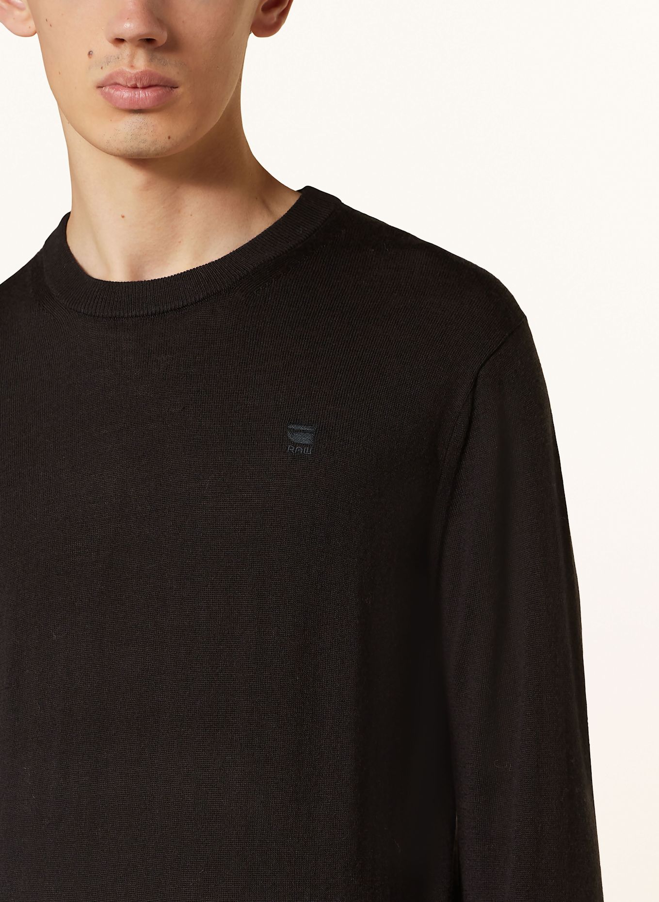 Star sweater black top