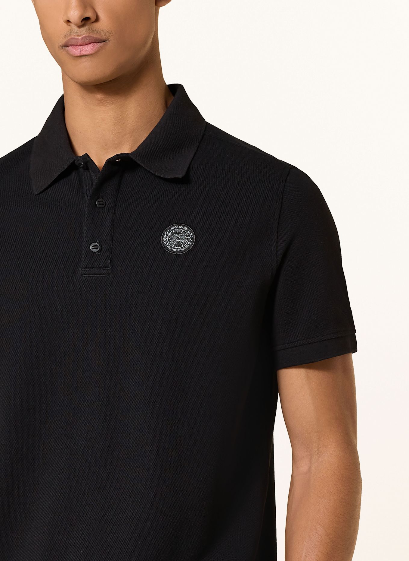 CANADA GOOSE Piqué-Poloshirt: SCHWARZ