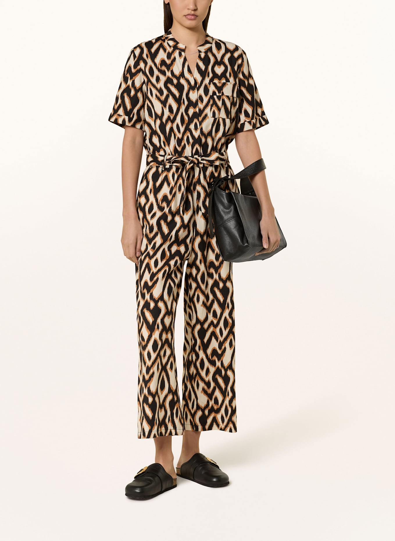 comma Jumpsuit: Jumpsuit with glitter thread