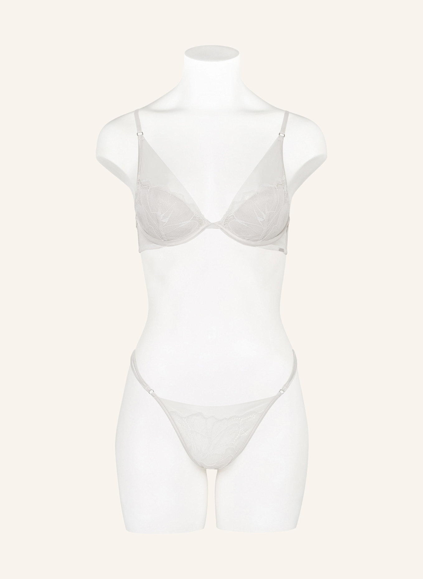 Calvin Klein Kalhotky String CK BLACK FLORAL LACE: KRÉMOVÁ