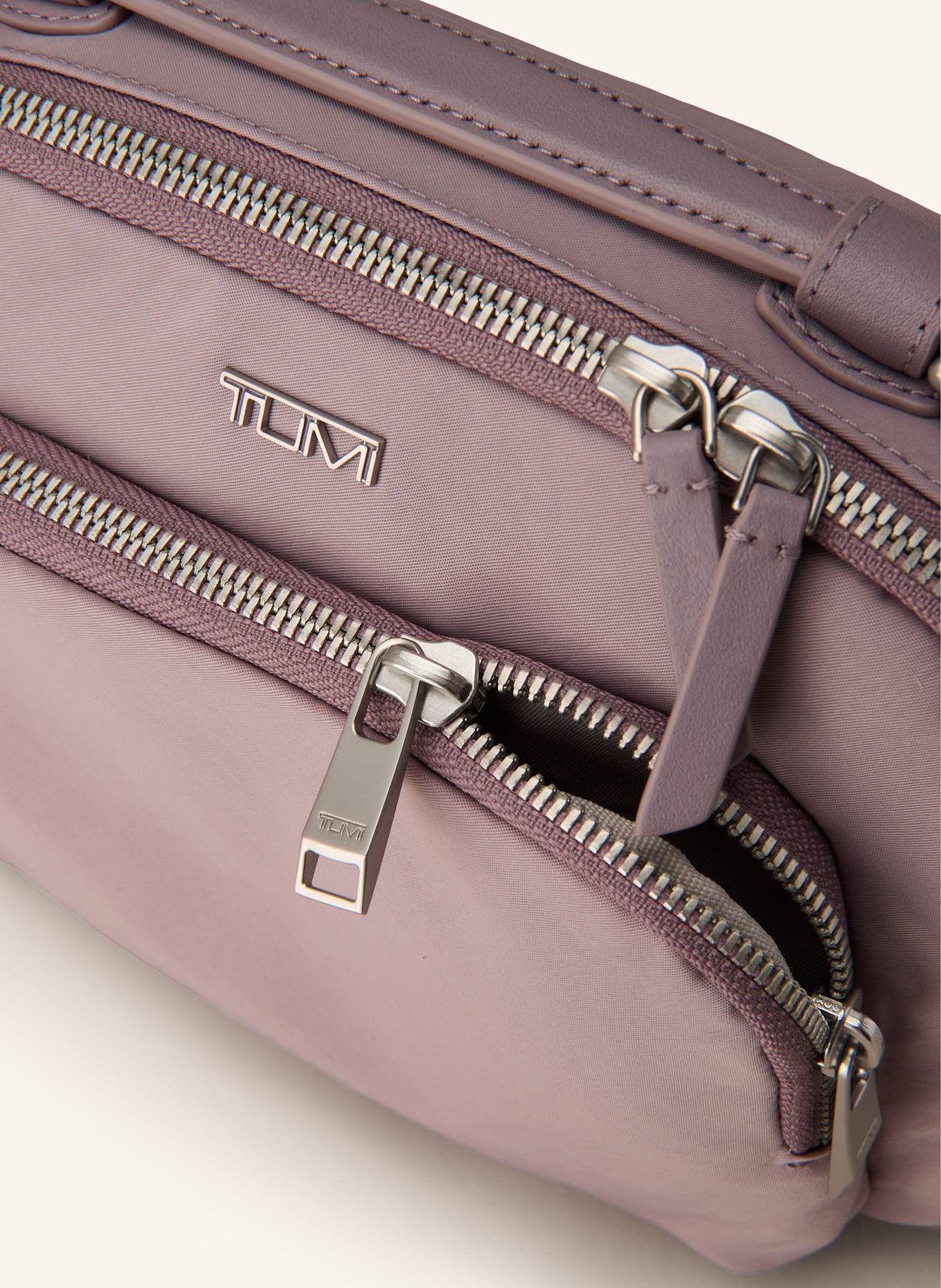 TUMI VOYAGEUR Umhängetasche TEGHAN: HELLLILA