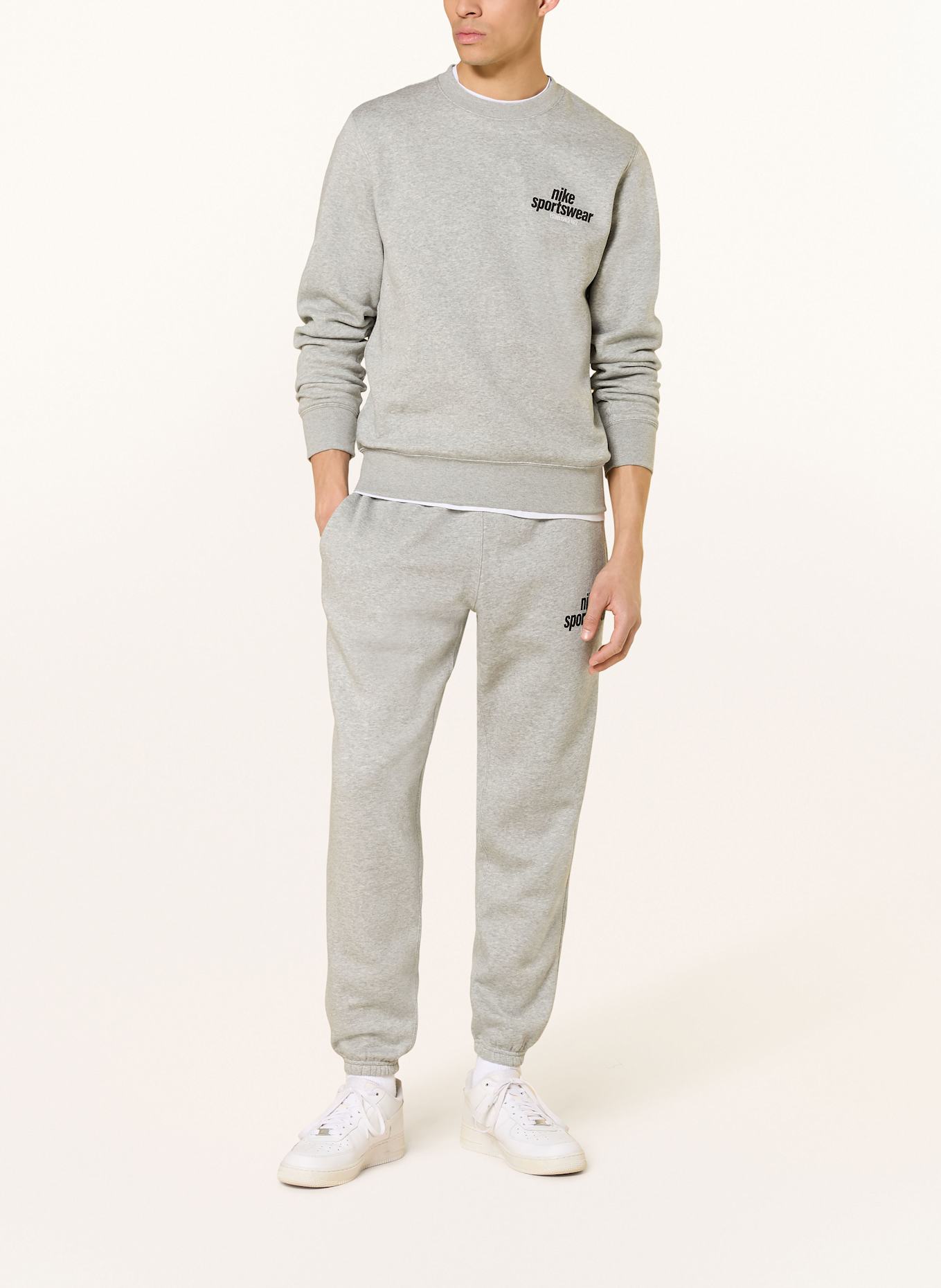 Nike Spodnie dresowe SPORTSWEAR CLUB: JASNOCZARY