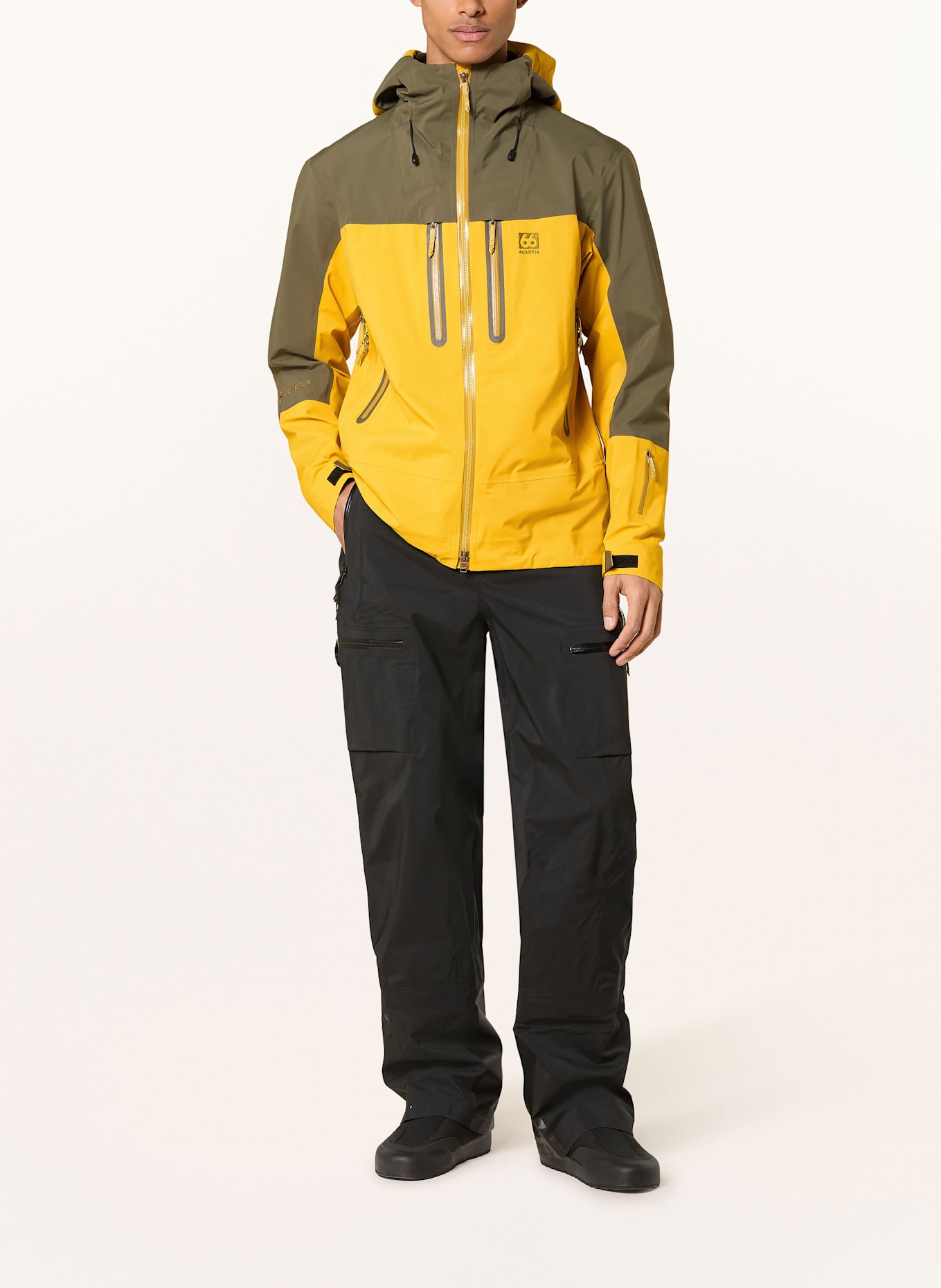 66°NORTH Hardshell-Jacke TRÖLLASKAGI GTX: DUNKELGELB / KHAKI