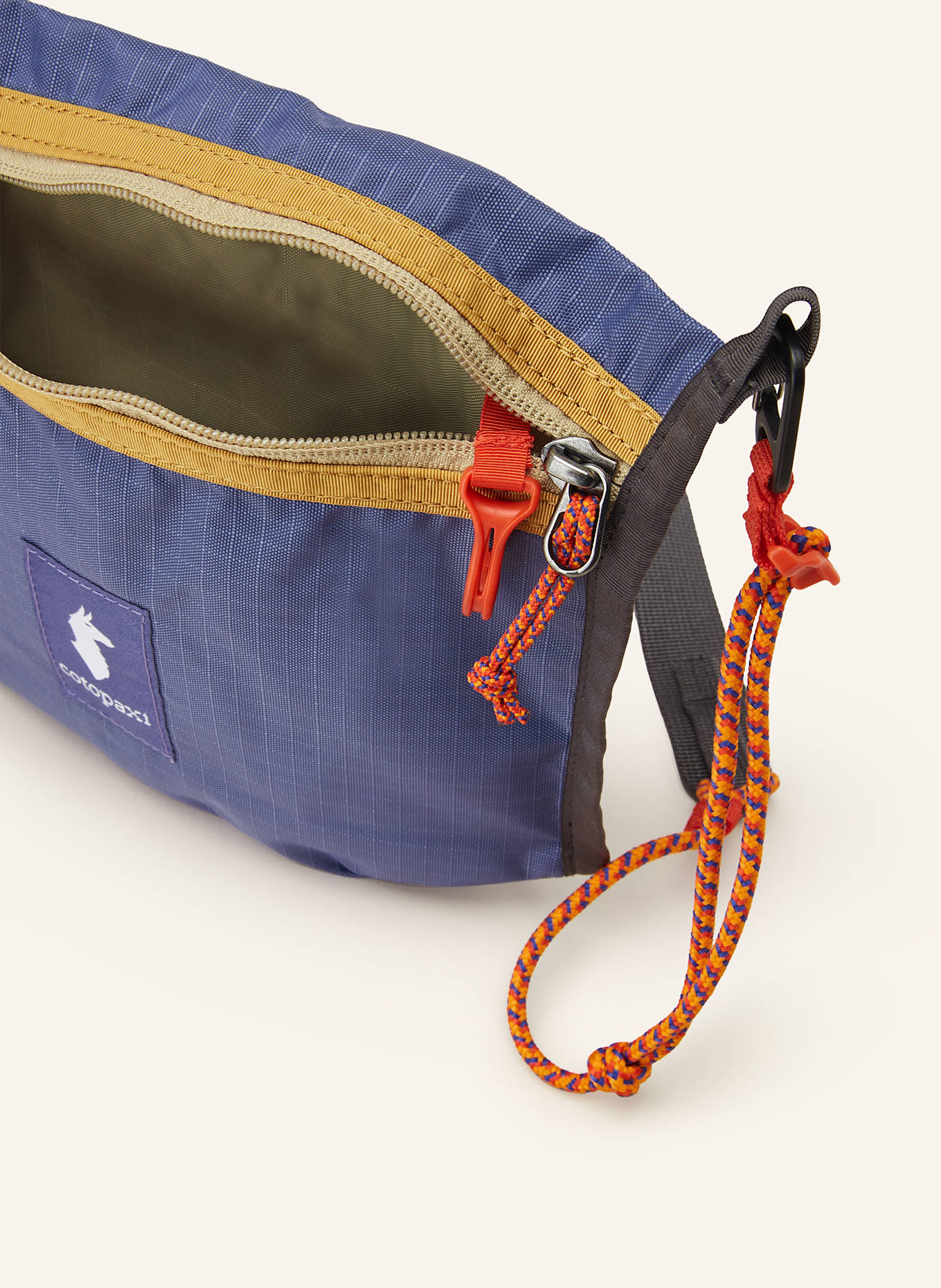 cotopaxi Kabelka přes rameno LISTA 2 L: FIALOVÁ