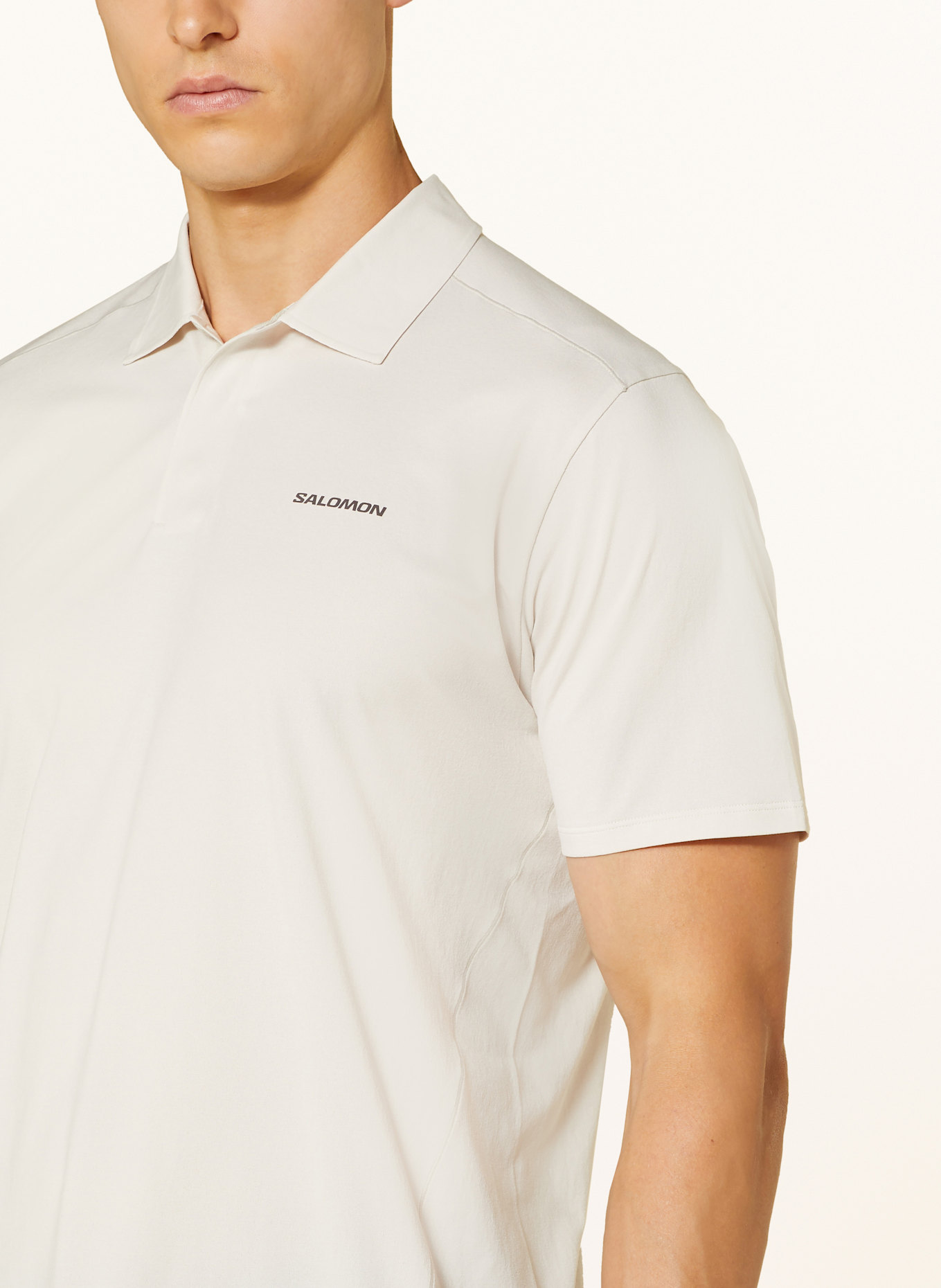 SALOMON Funktions-Poloshirt TRACKLINE: CREME