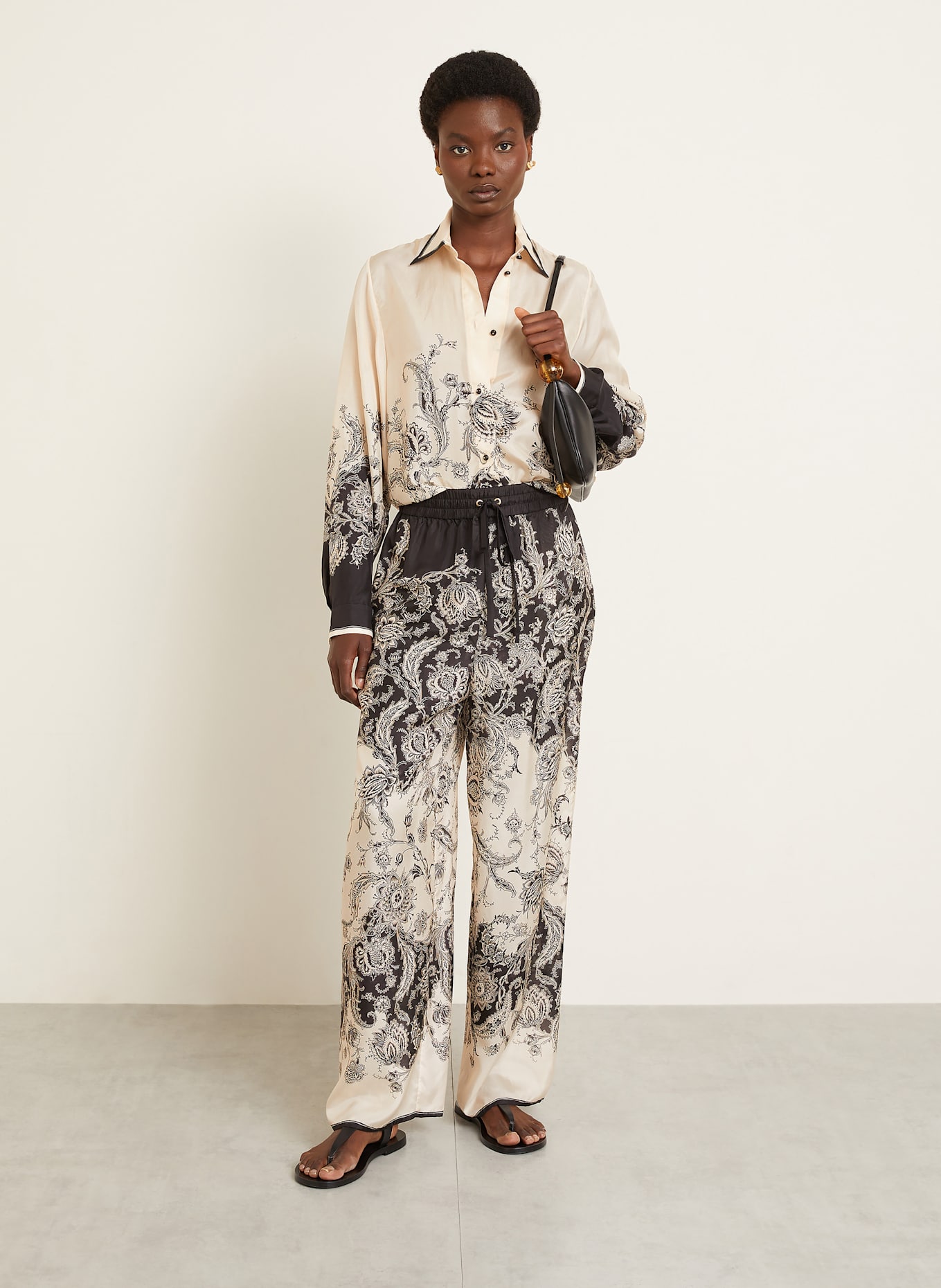 ボトムスその他 ZIMMERMANN Cream Rhiannon trousers with fantasy print Zimmermann Rhiannon Paisley Print Belted Linen Flare Pants
