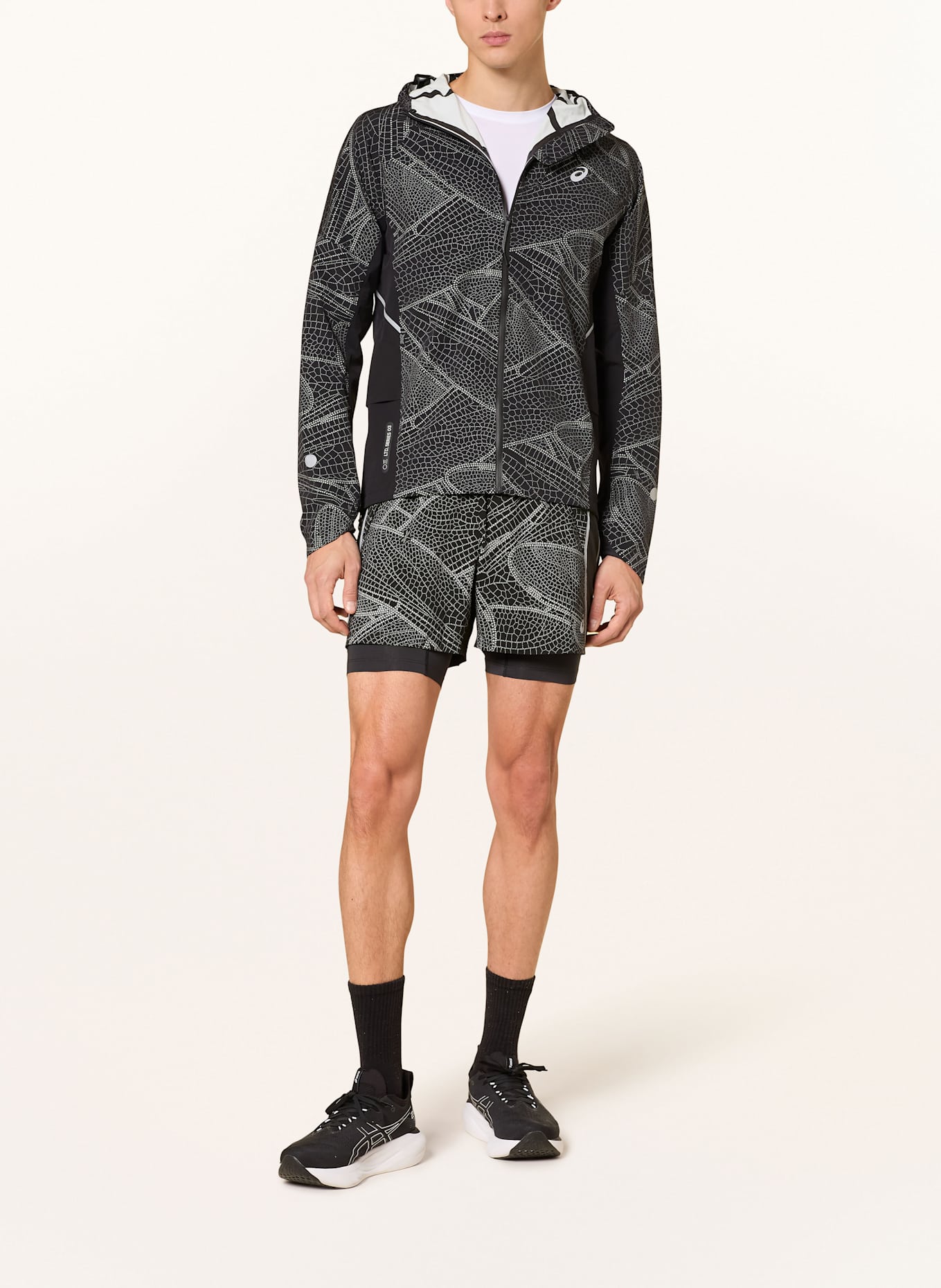 ASICS Laufjacke LIMITED SERIES LITE-SHOW: SCHWARZ / HELLGRAU