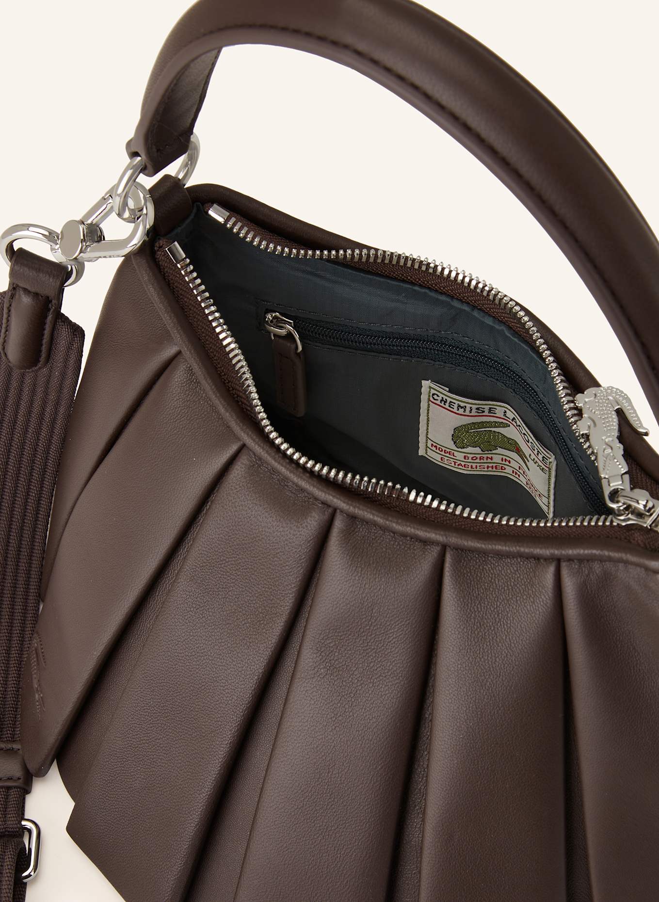 LACOSTE Umhängetasche RUNWAY LENGLEN SMALL: DUNKELBRAUN