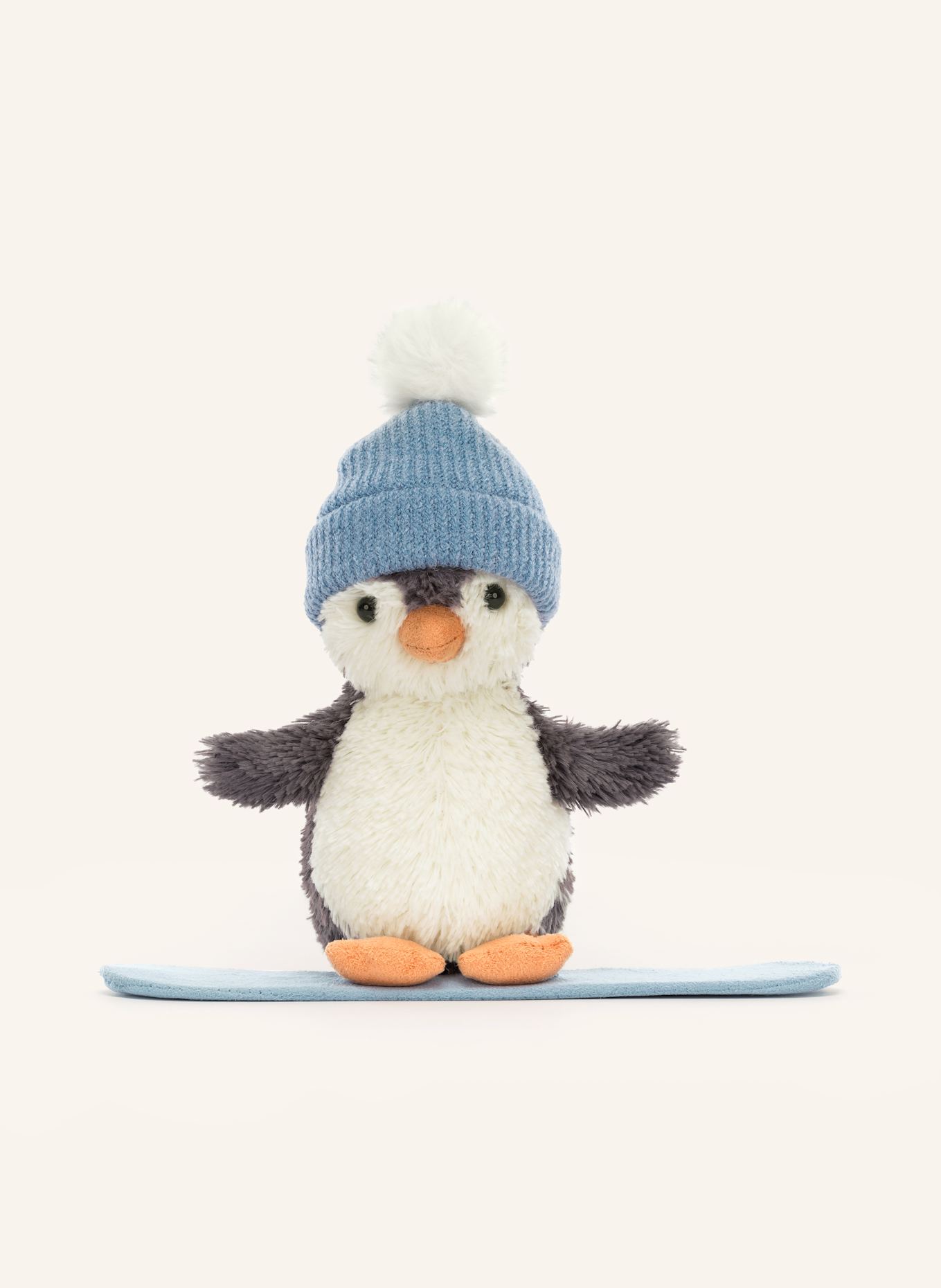 Jellycat Peluche pingouin PEANUT PENGUIN SNOWBOARDING: CRÈME / GRIS FONCÉ / BLEU CLAIR