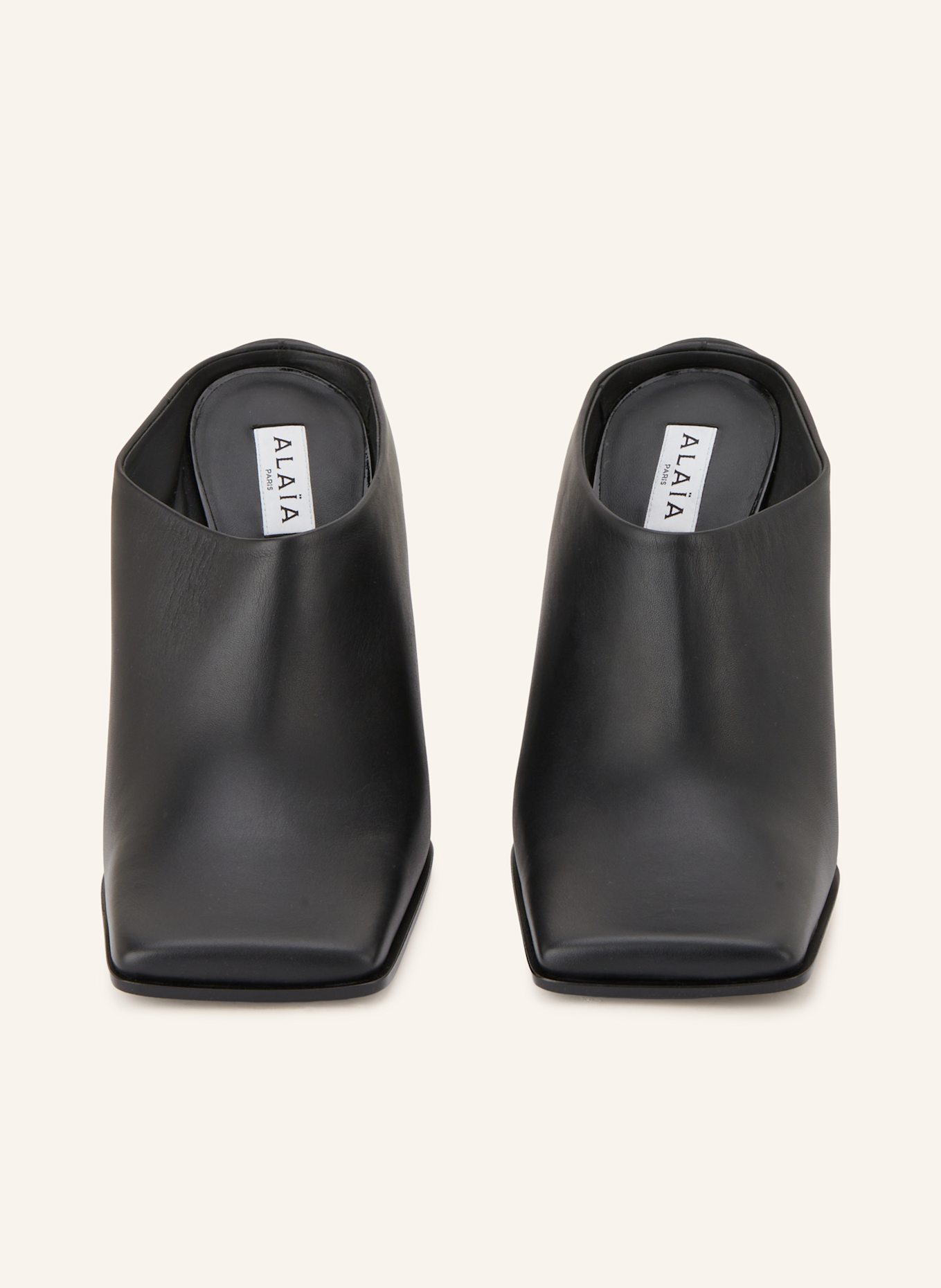 ALAÏA Mules: SCHWARZ