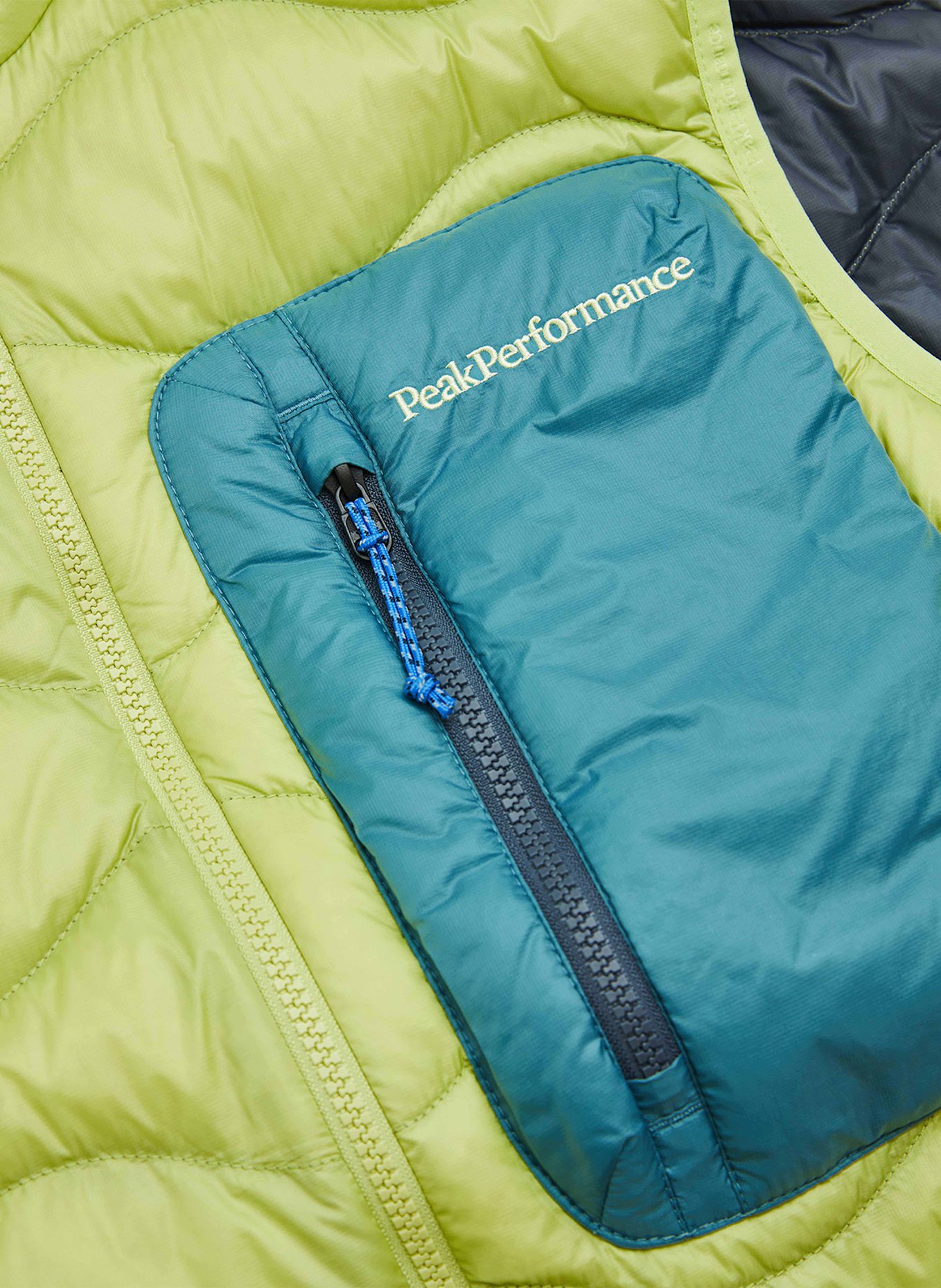 Peak Performance Daunenweste UTILITY HELIUM: GRÜN