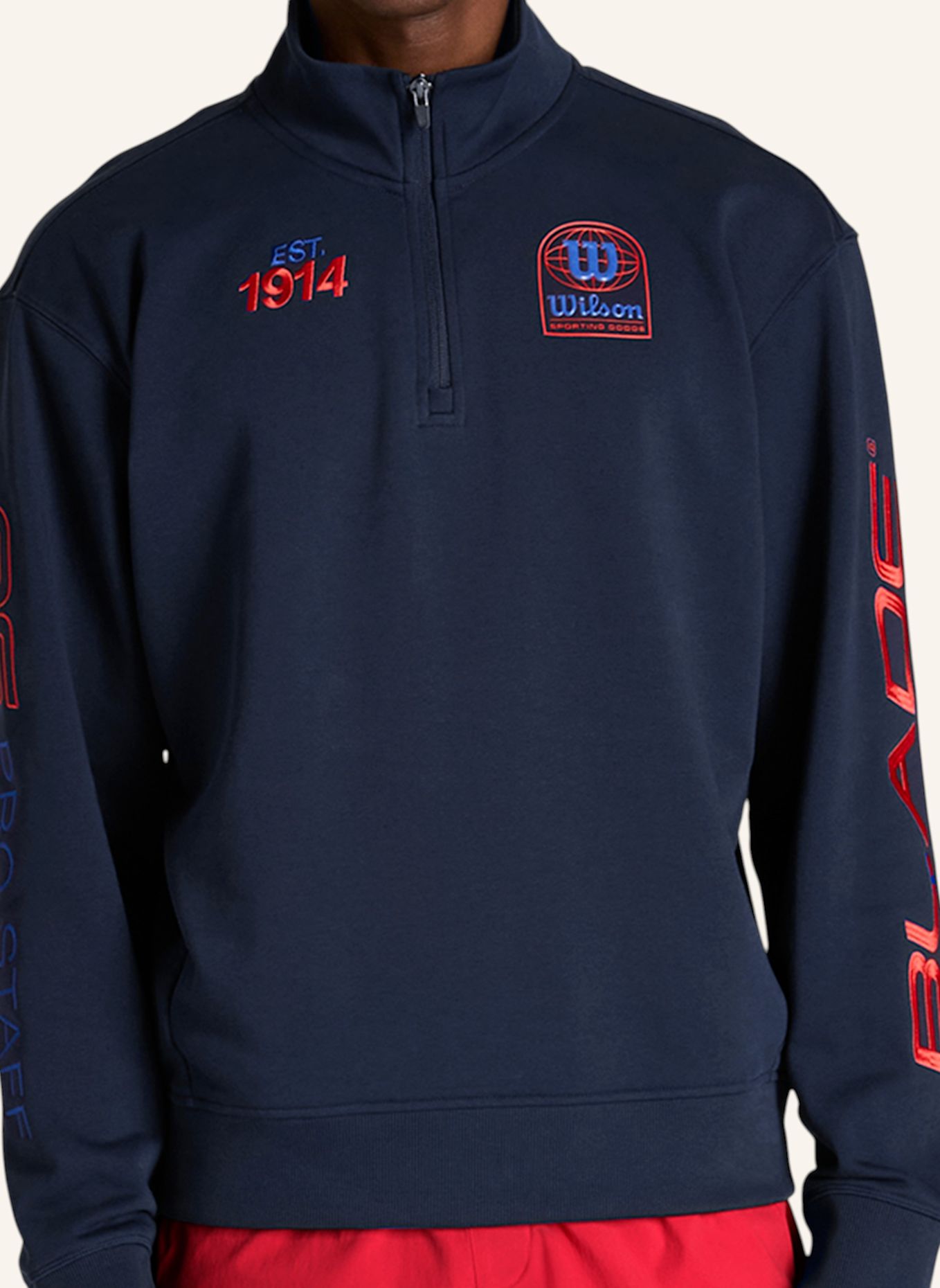 Wilson Sweatshirtjacke M PLAYSTATE HALF ZIP SWEATSHIRT: ROT / BLAU