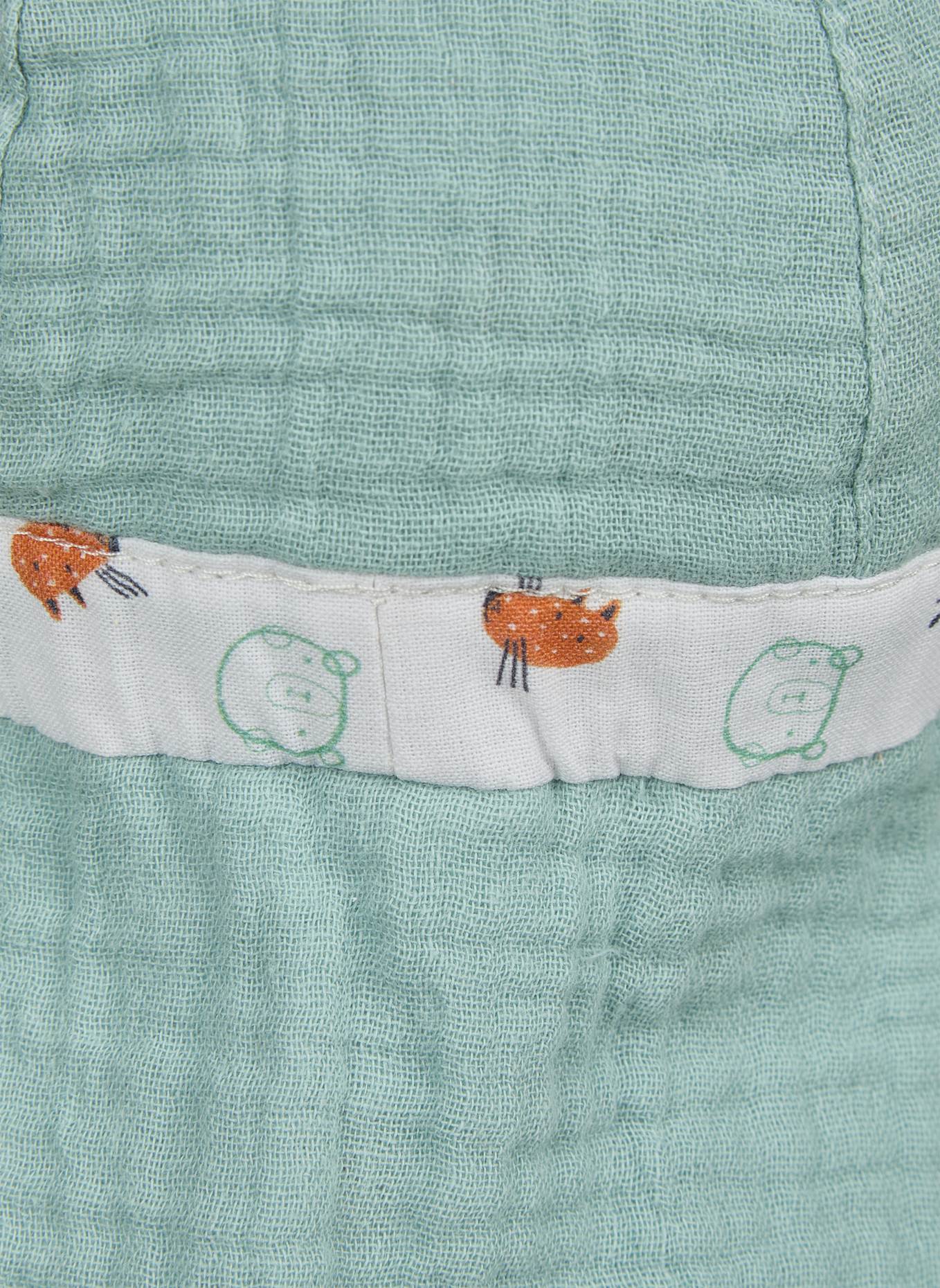 Sterntaler Wende-Schirmmütze Tiere: TÜRKIS