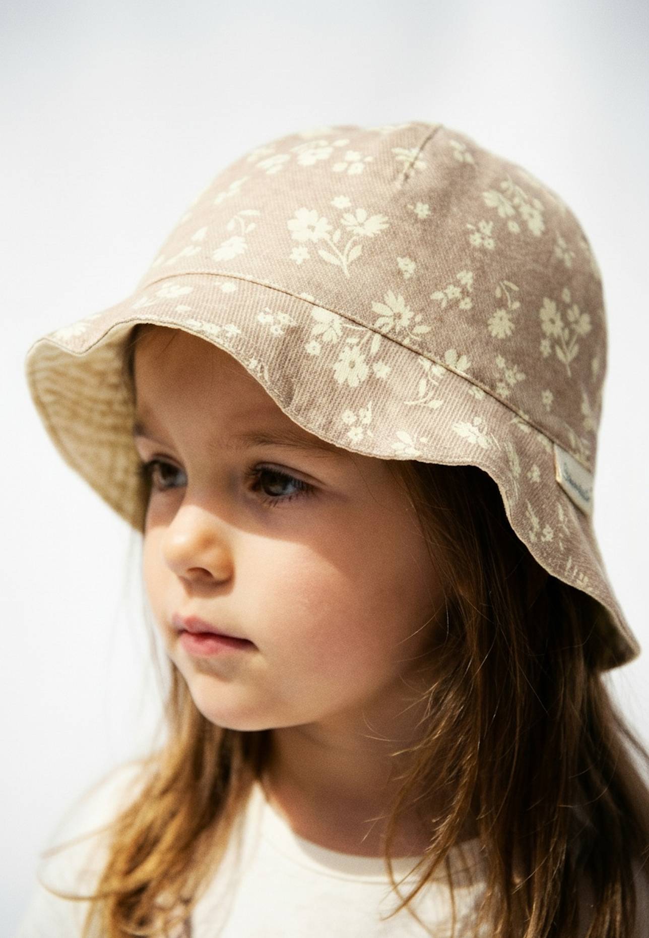 Sterntaler Wende-Sonnenhut blumig: TAUPE