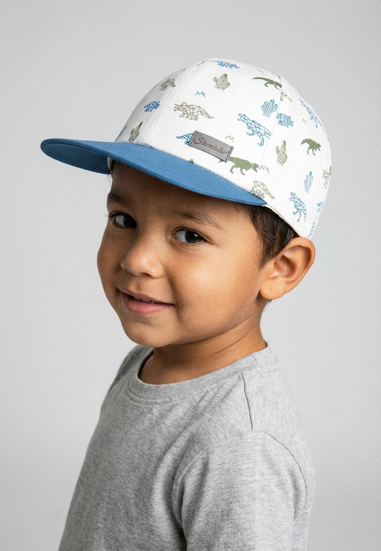 Sterntaler Basecap Saurier: WEISS