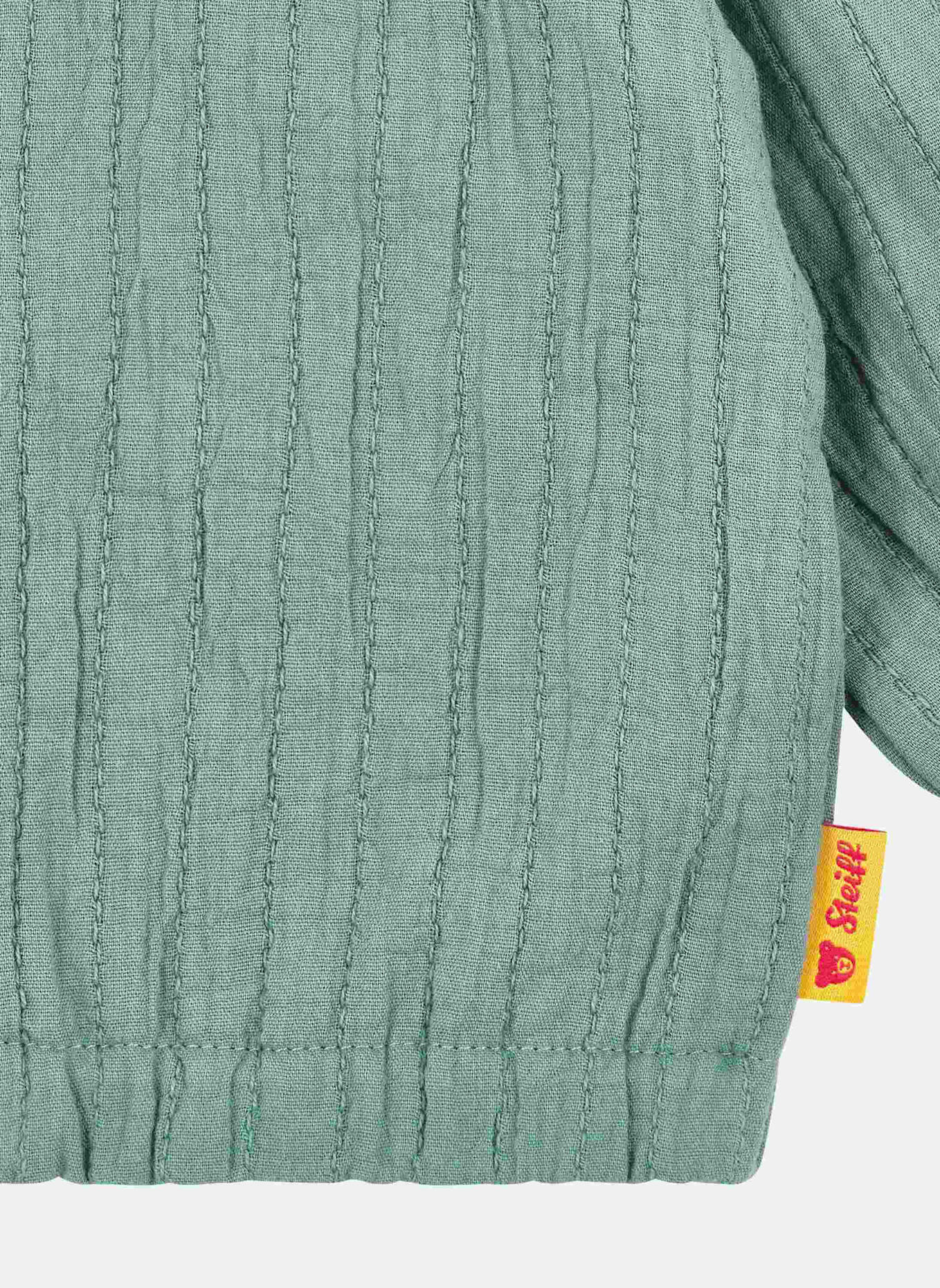 Steiff Strickjacke DINOSAUR: PETROL