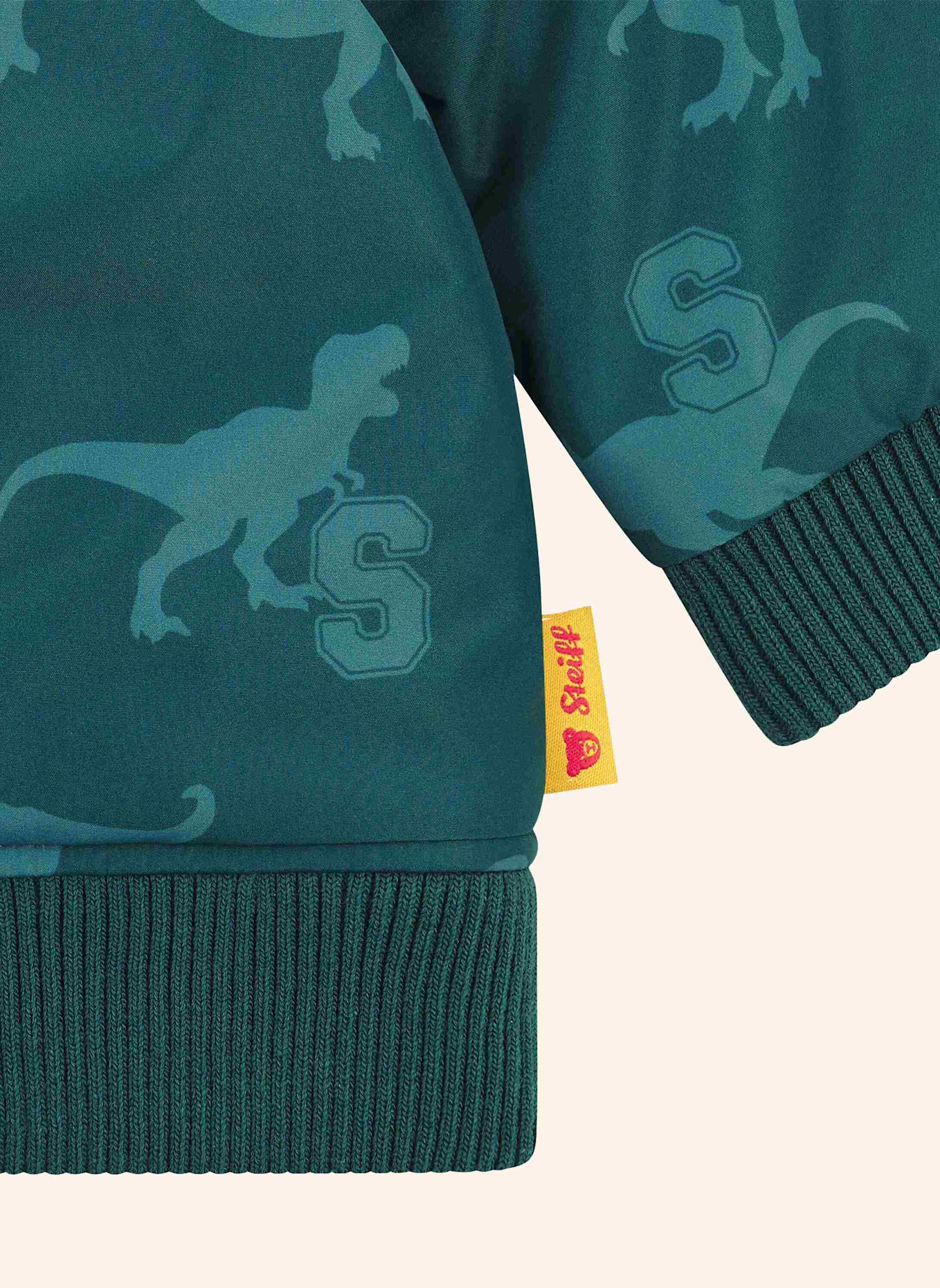 Steiff Wendejacke DINOSAUR: PETROL