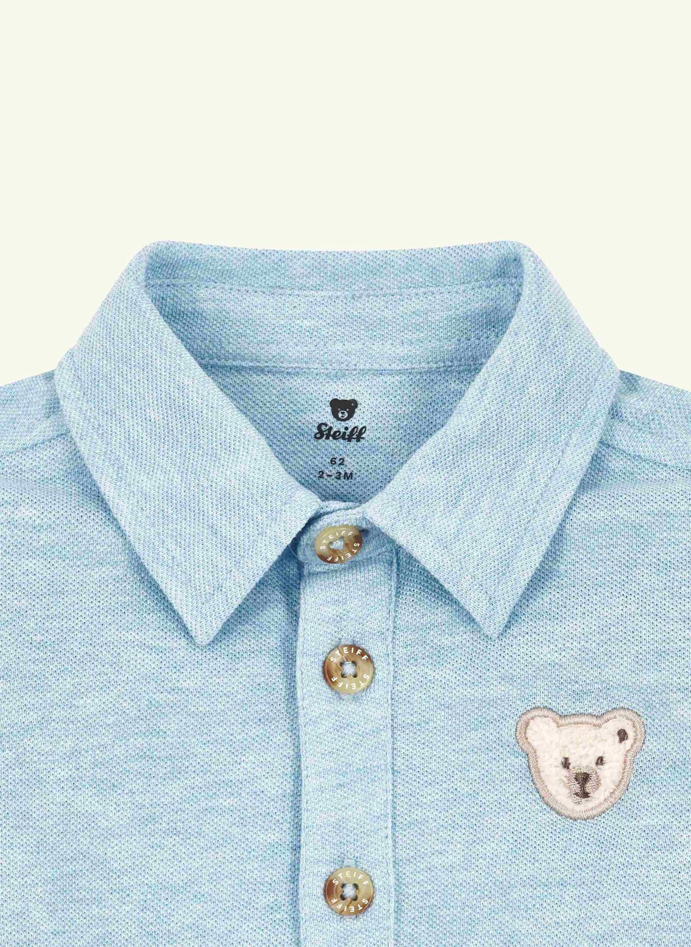 Steiff Latzhose DINOSAUR: BLAU