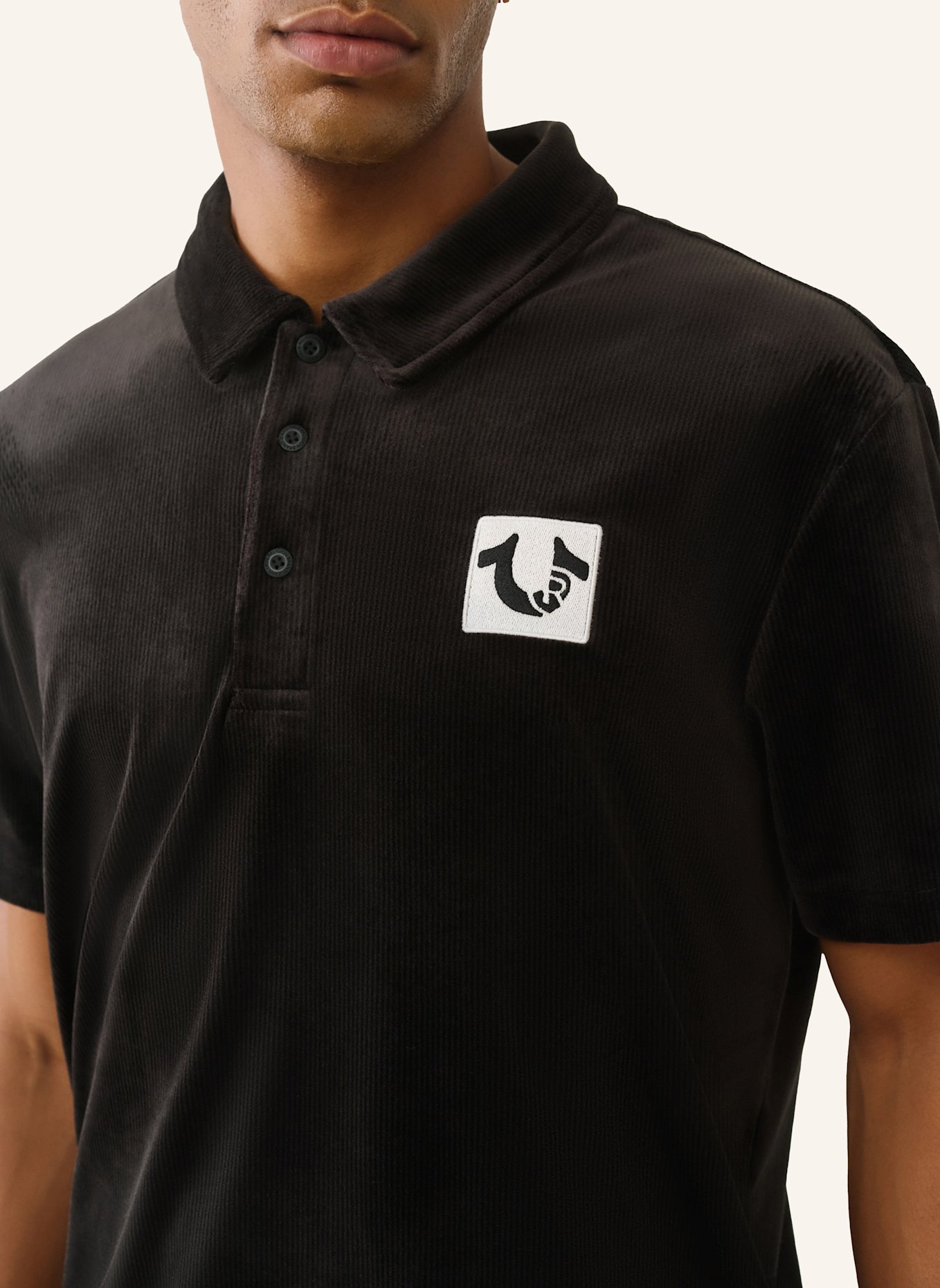 TRUE RELIGION Poloshirt: SCHWARZ