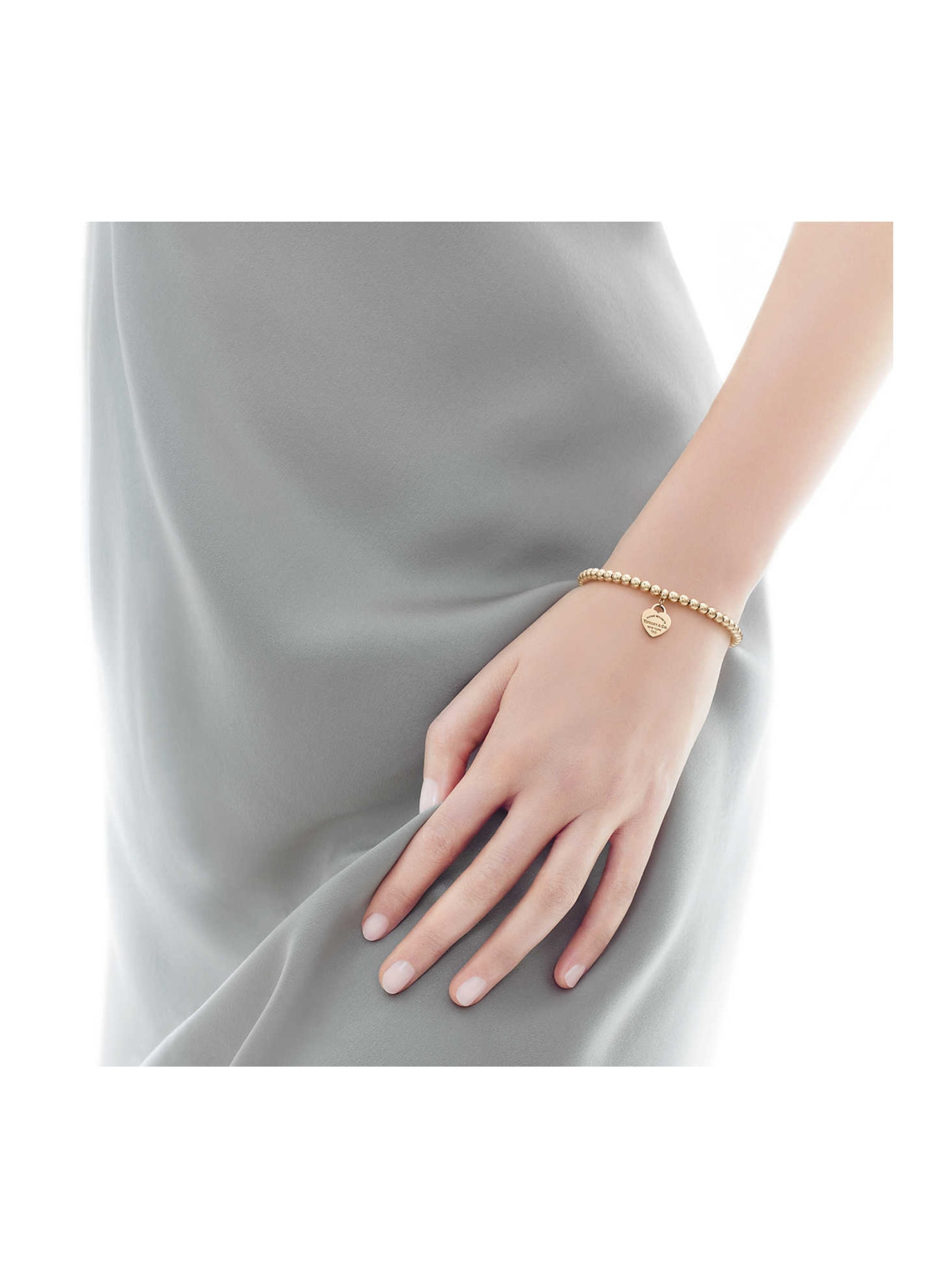 TIFFANY & Co. Wisiorek RETURN TO TIFFANY™ z 18-karatowego żółtego złota z brylantami: ZŁOTY